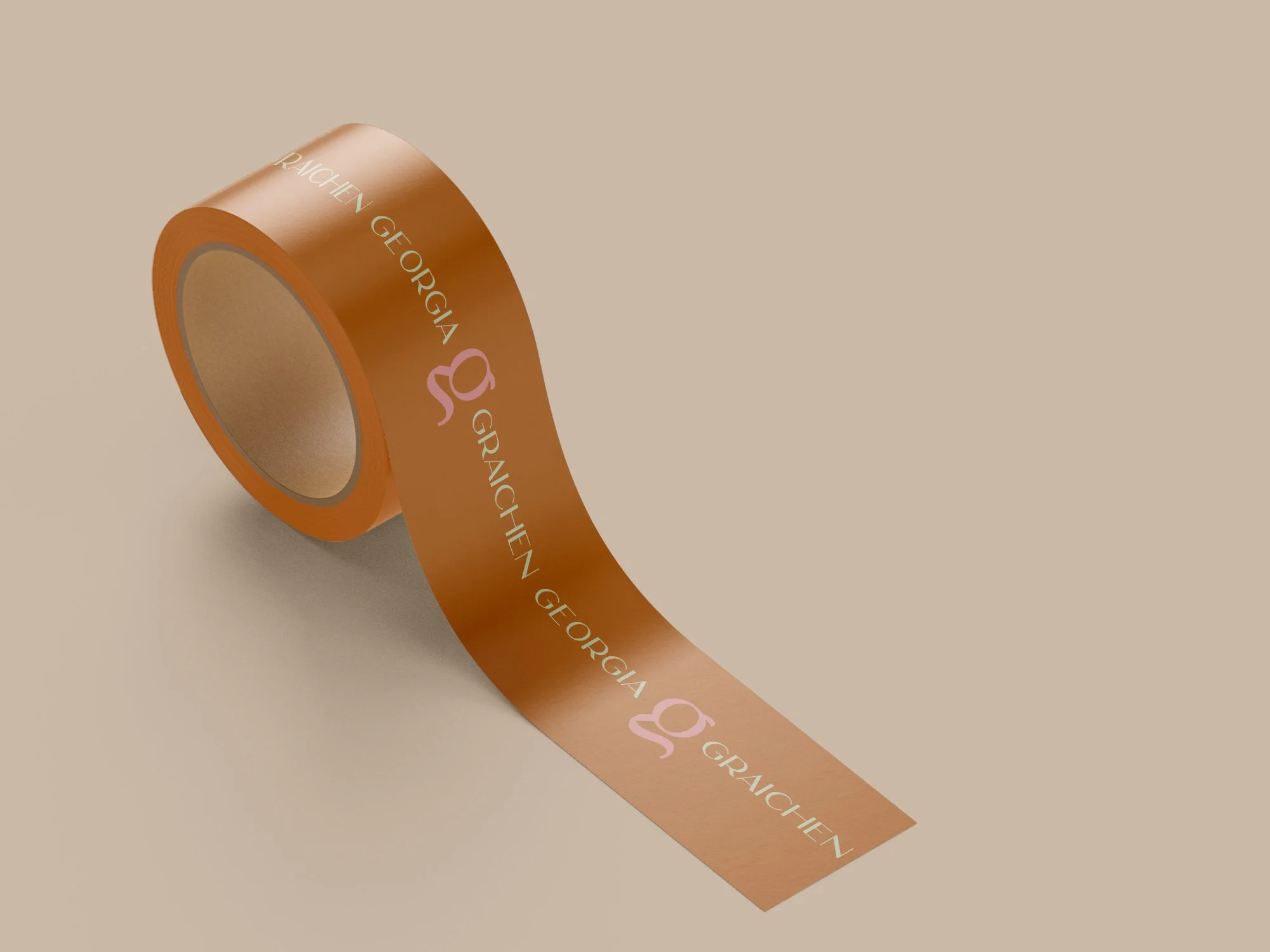 mockup de fita adesiva com identidade visual da marca Georgia Graichen.