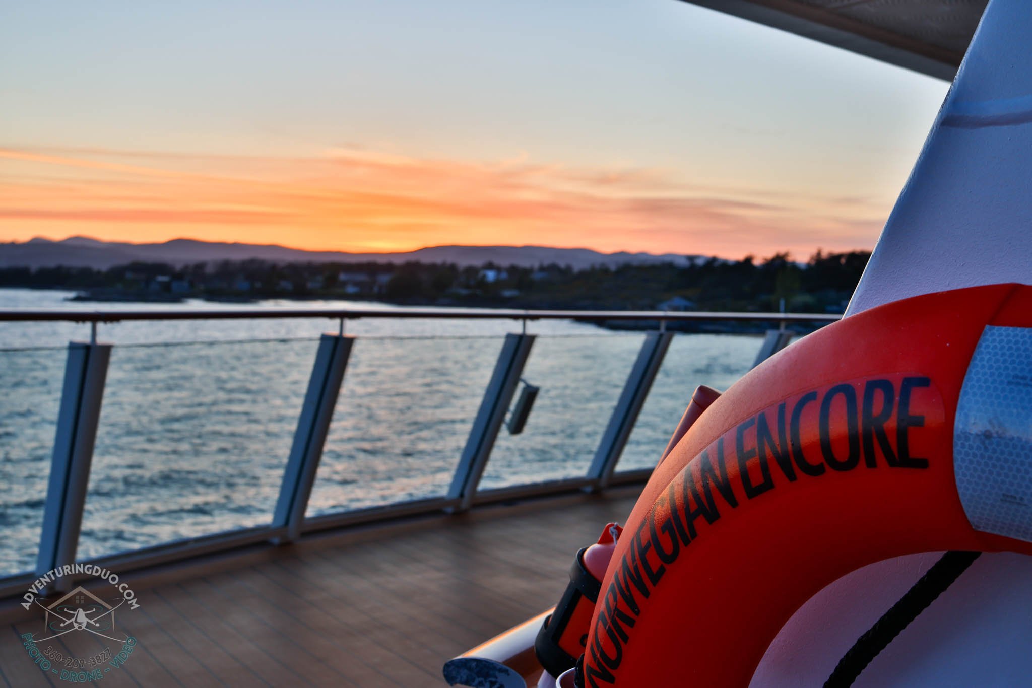 Life ring of the Norwegian Encore with sunset background
Brand-aligned shot capturing cruise safety detail and the peaceful end of day over Canadian waters.