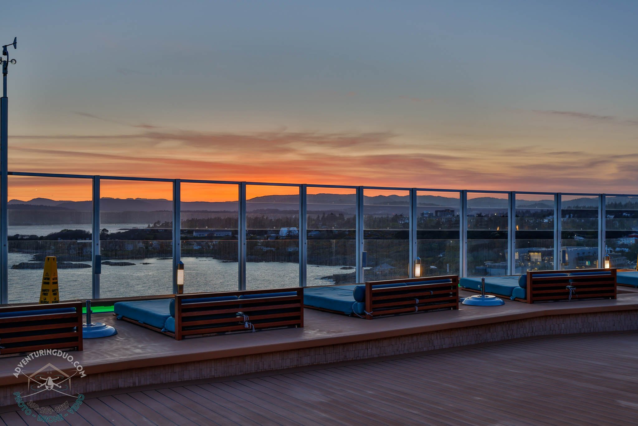 Poolside loungers facing ocean sunset from Norwegian Encore
Soft light and curated design reflect the peaceful ambiance of upscale cruise travel on this NCL voyage.