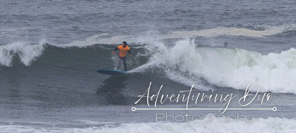 male surfer catching some waves in Westport, Washington at the Westport Longboard Classic 2025.