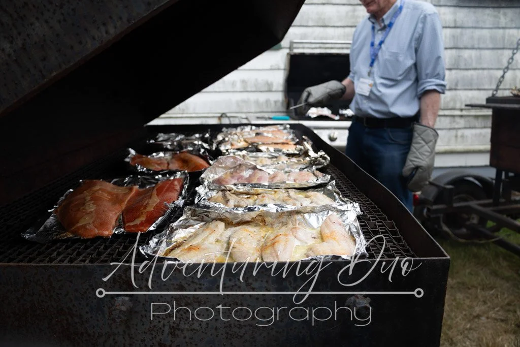wood fired grill cooking up some fresh caught salmon and lingcod. locally caught in Westport, WA