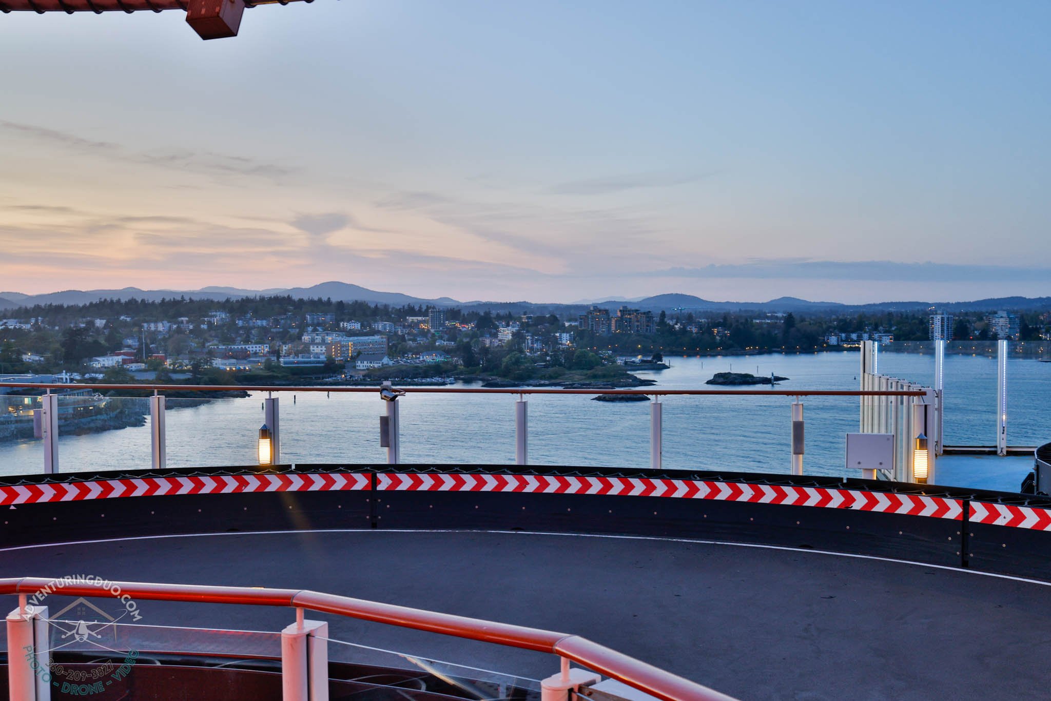 View from Norwegian Encore Speedway overlooking Victoria’s coastline
A sweeping coastal view from the Norwegian Encore's top deck go-kart track, photographed by Adventuring Duo at twilight. Cruise adventure meets west coast elegance.