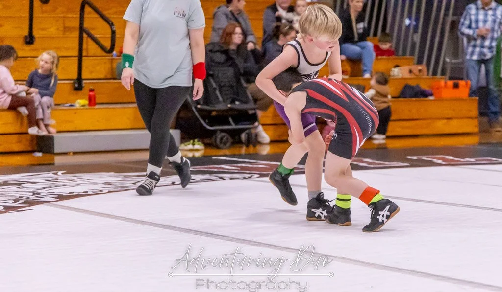 two youth wrestlers mid action. Westport, Washington