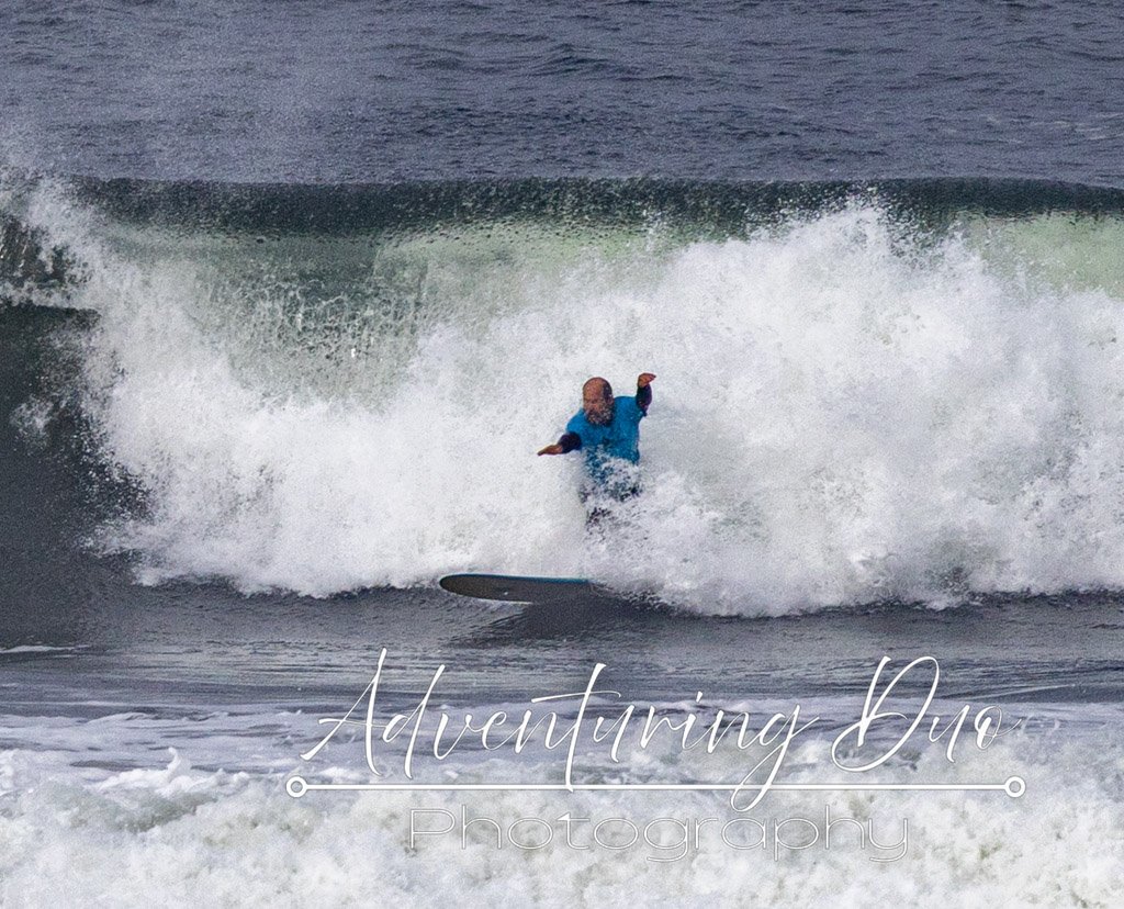 male surfer catching some waves in Westport, Washington at the Westport Longboard Classic 2025.