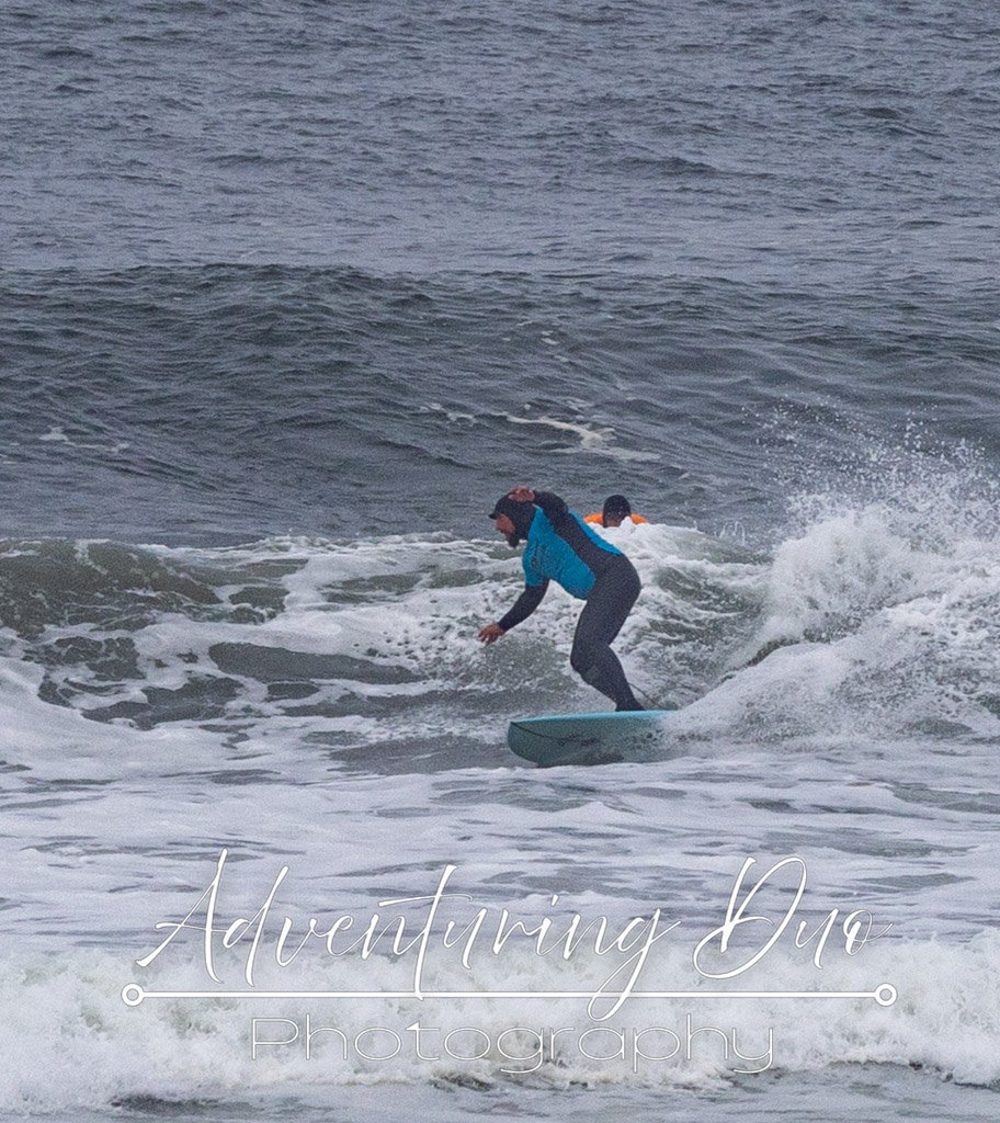 male surfer catching some waves in Westport, Washington at the Westport Longboard Classic 2025.