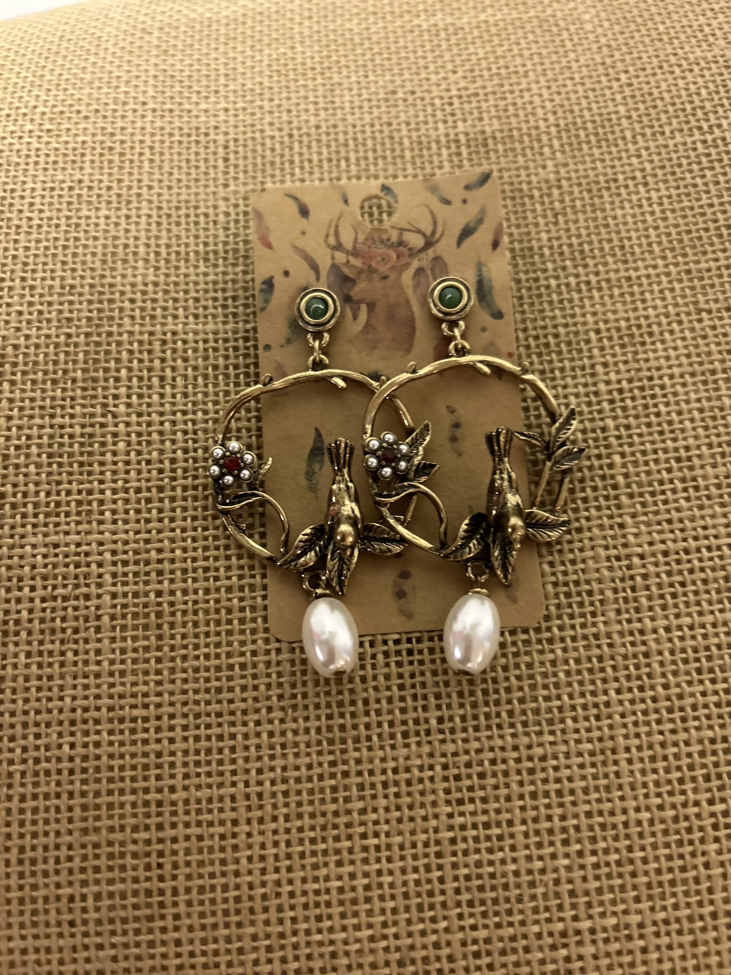 Gold tone birds earrings