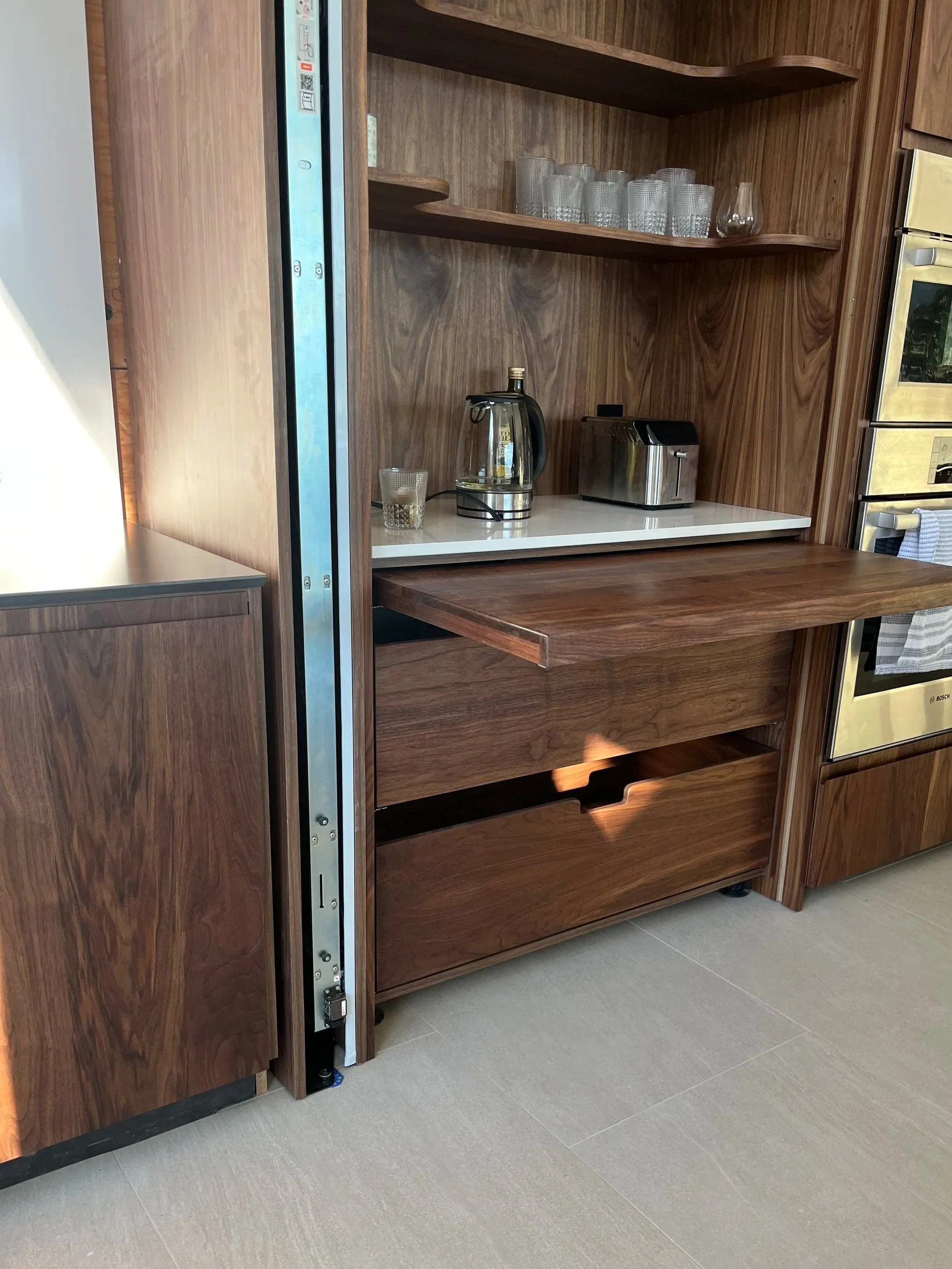 Custom made walnut pullout shelf