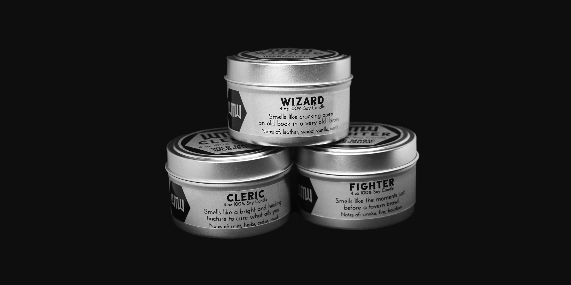 Three small tins labeled 'Wizard,' 'Cleric,' and 'Fighter,' each containing a soy candle with different scent descriptions on a black background.