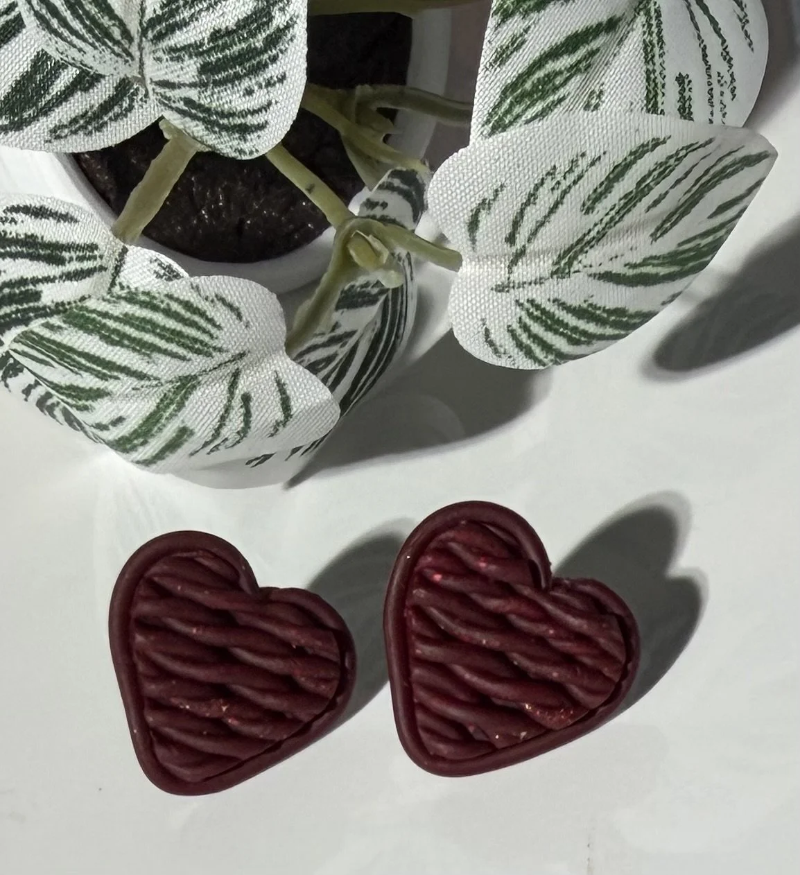 Heart knit studs