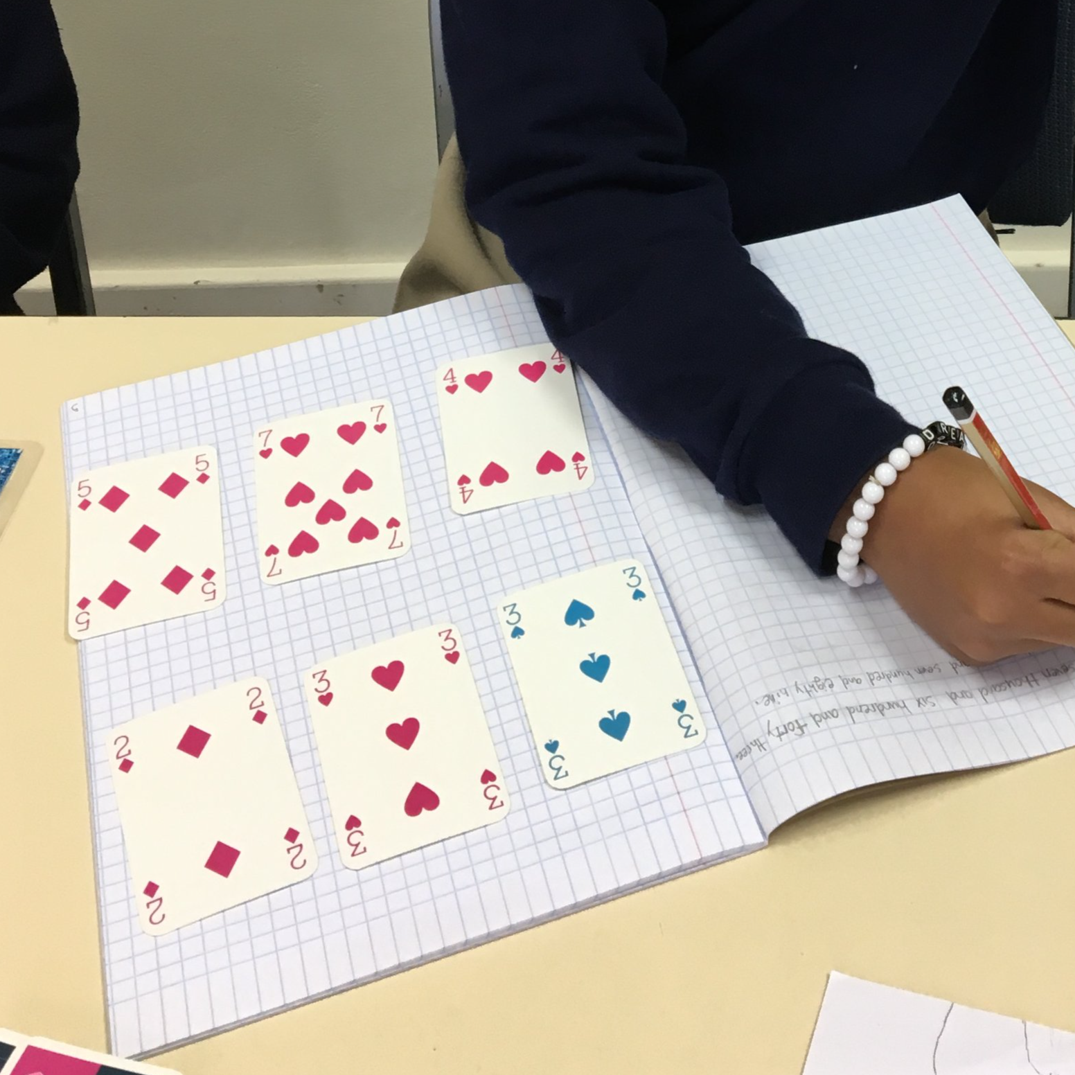 adding multi-digit numbers using cards provides practice that is unique and engaging
