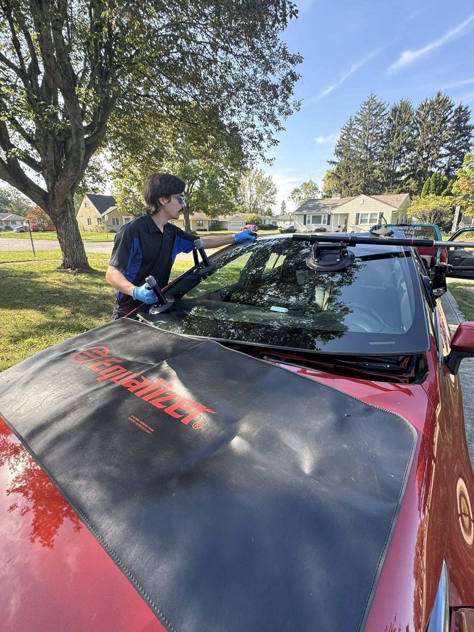 Technician setting a window