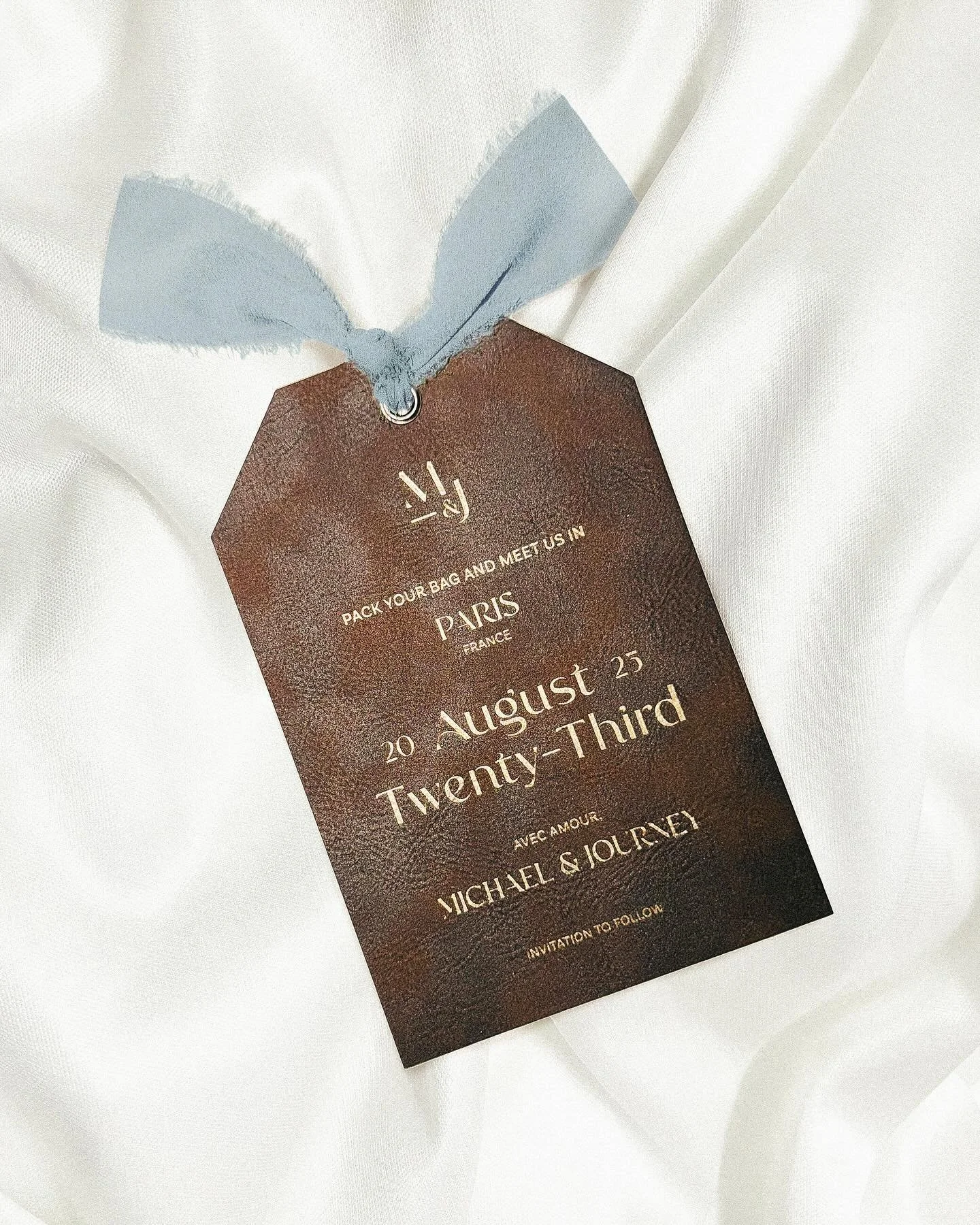 On the 11th Day of Christmas, we&rsquo;re already ready for another holiday break&hellip;so let&rsquo;s revisit the Voyage suite 🧳

This leather luggage tag styled save the date is perfect for a travel themed event! Dark, &ldquo;weathered&rdquo; lea