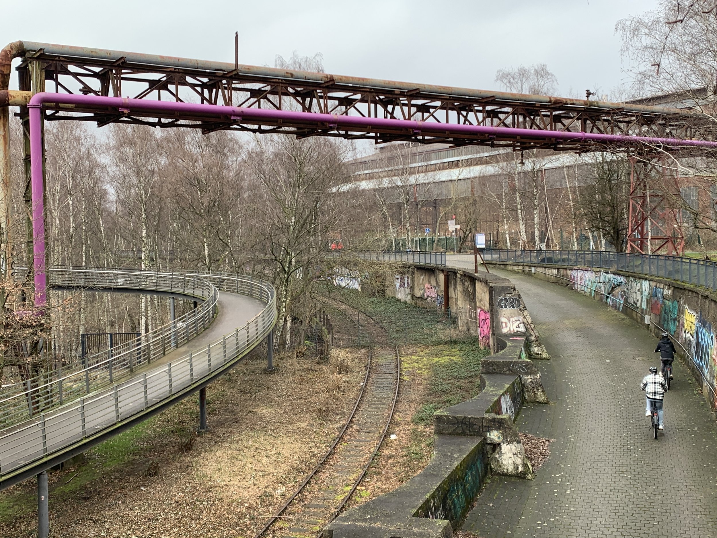 Pedestrians biking at Westpark in Bochum, Germany