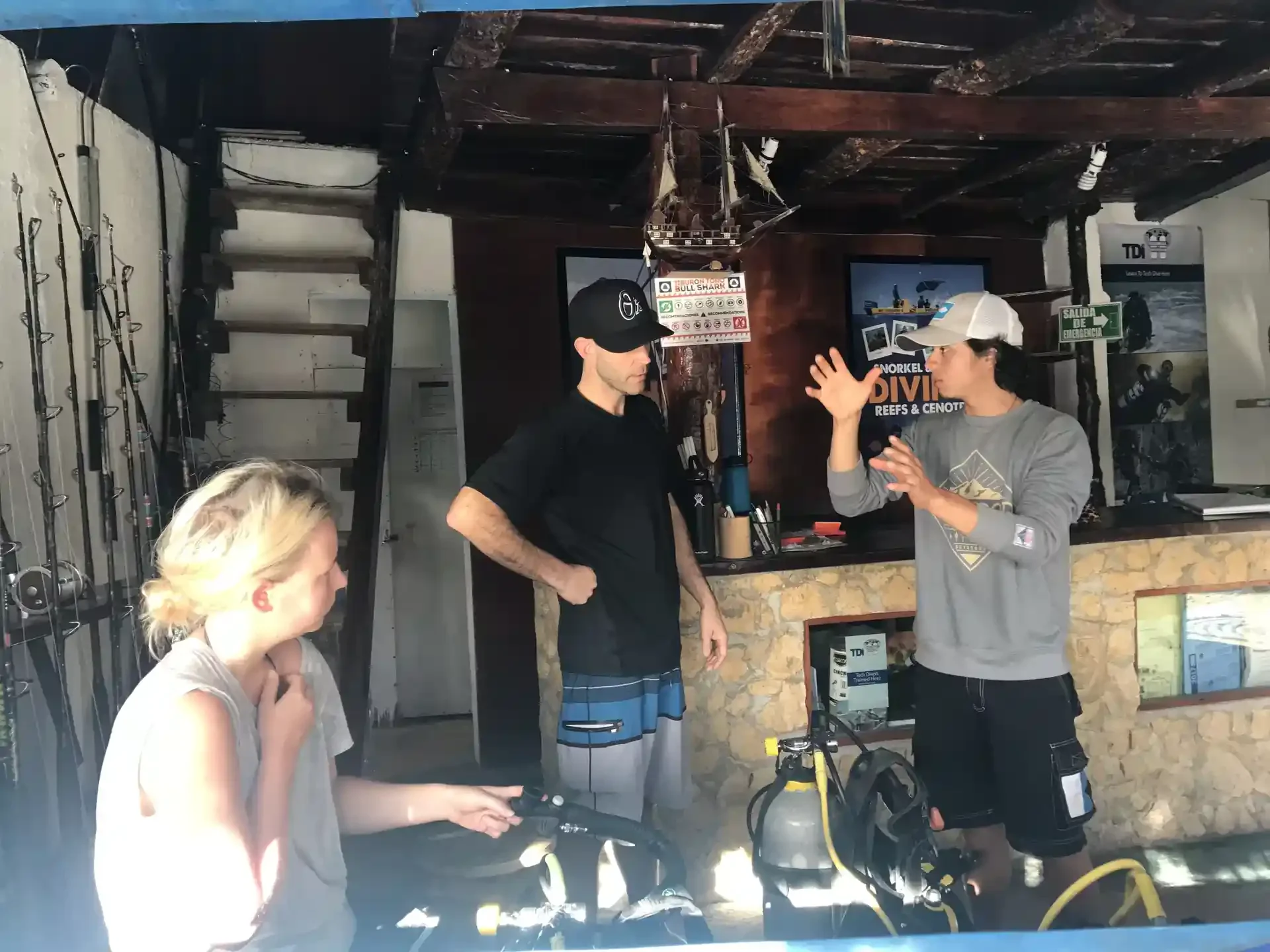 PADI Divemaster training at Mexidivers Tulum with instructor explaining scuba equipment and procedures