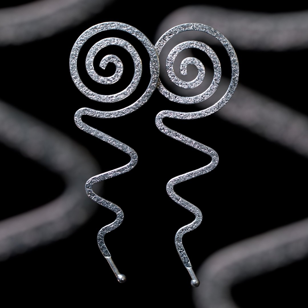 Silver Brass Swirls.jpeg