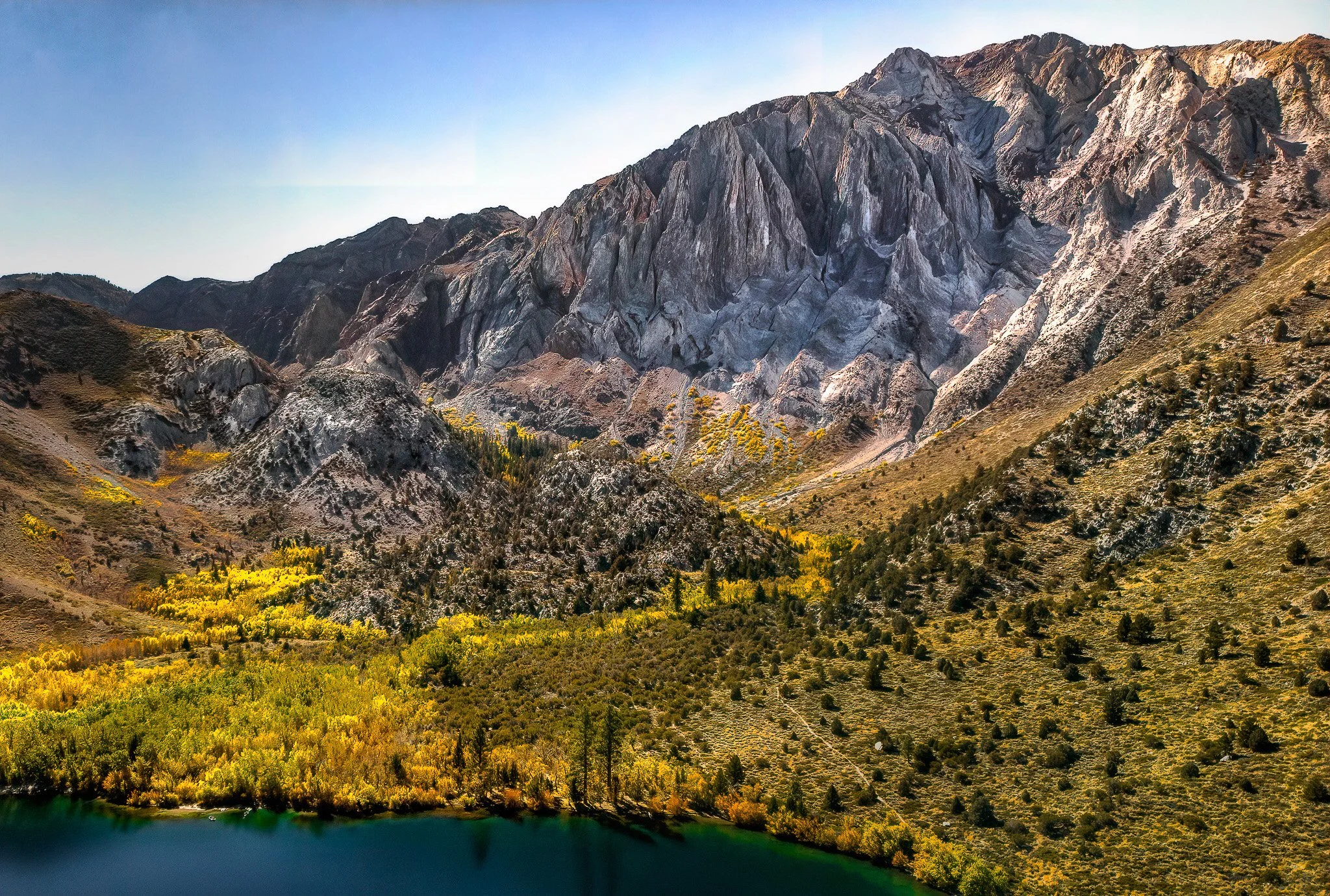 drone shot of convict lake and mount laurel in fall colors