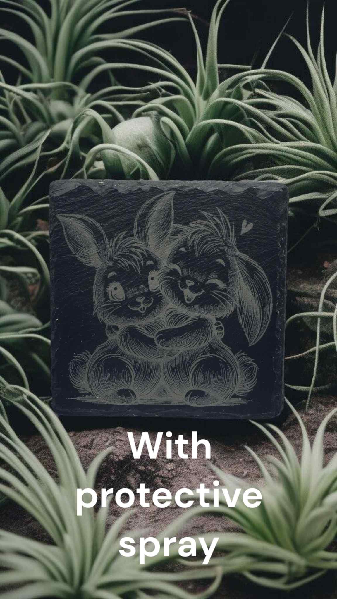 engraved slate coaster with two bunnies hugging with protective coating
