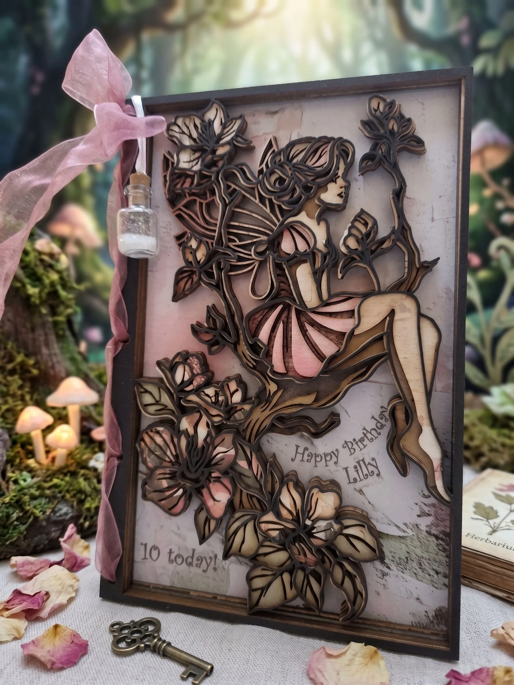 Layered fairy card with pink ribbon and fairy.jpg