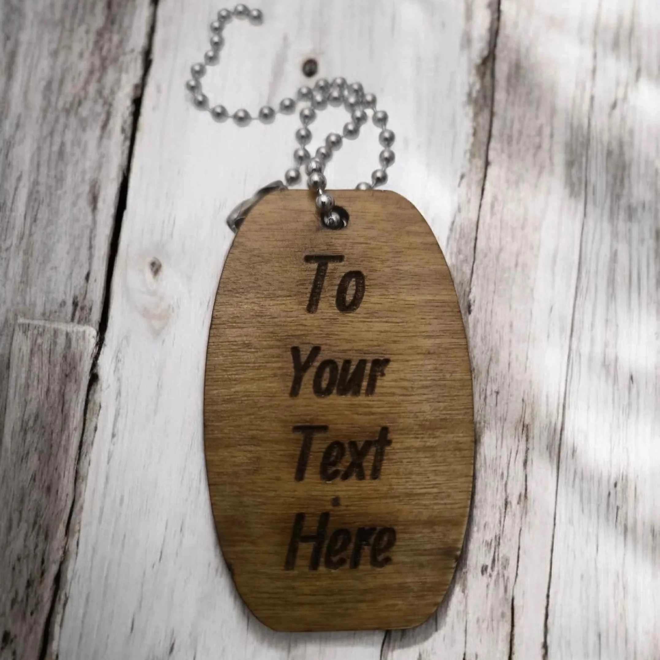 Personalised wooden tag with custom message—perfect for golfing retirement or birthday gifts.