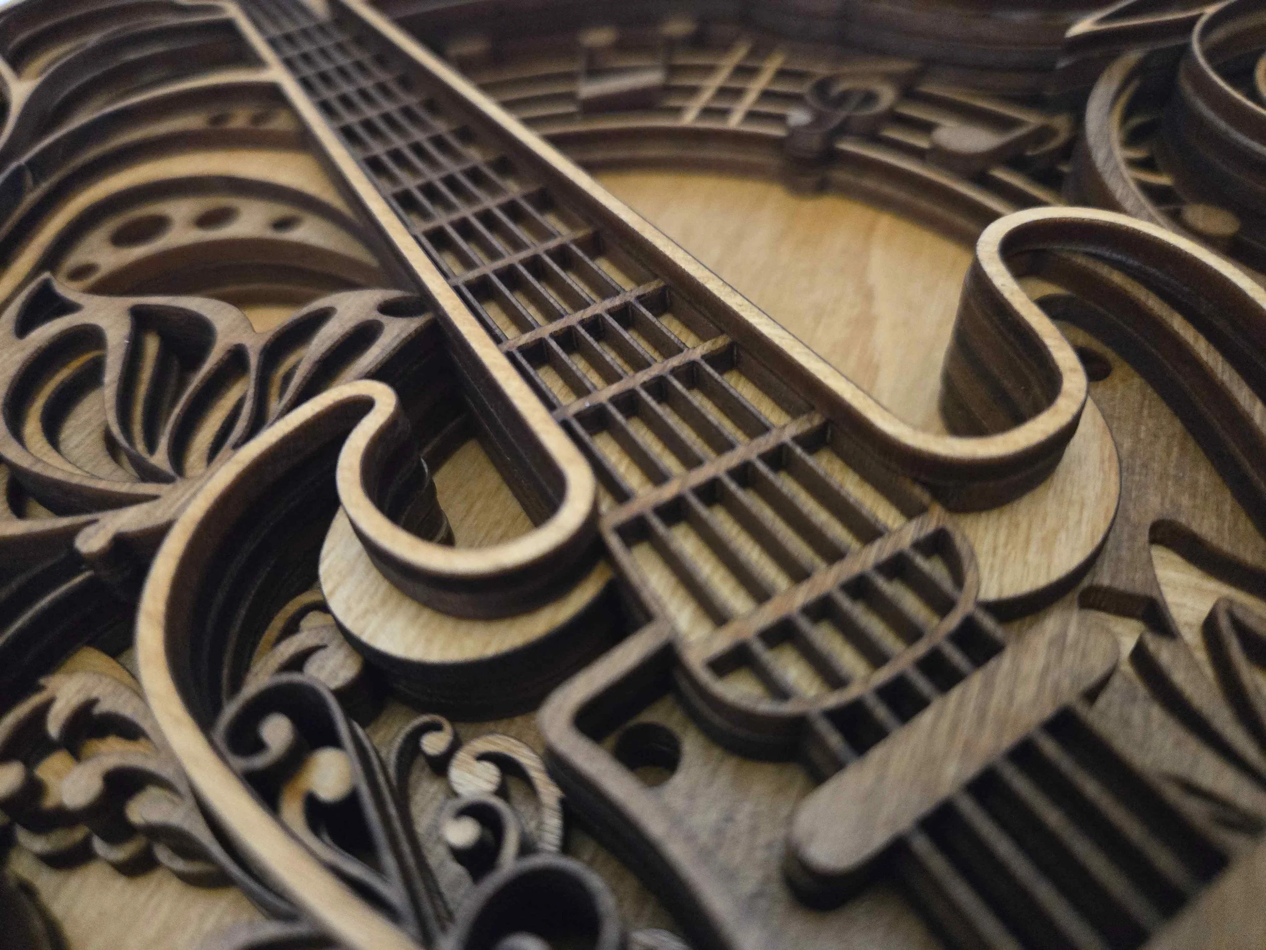 Close up of 7 layers of wood showing the 3D depth and contrasting oak stains.