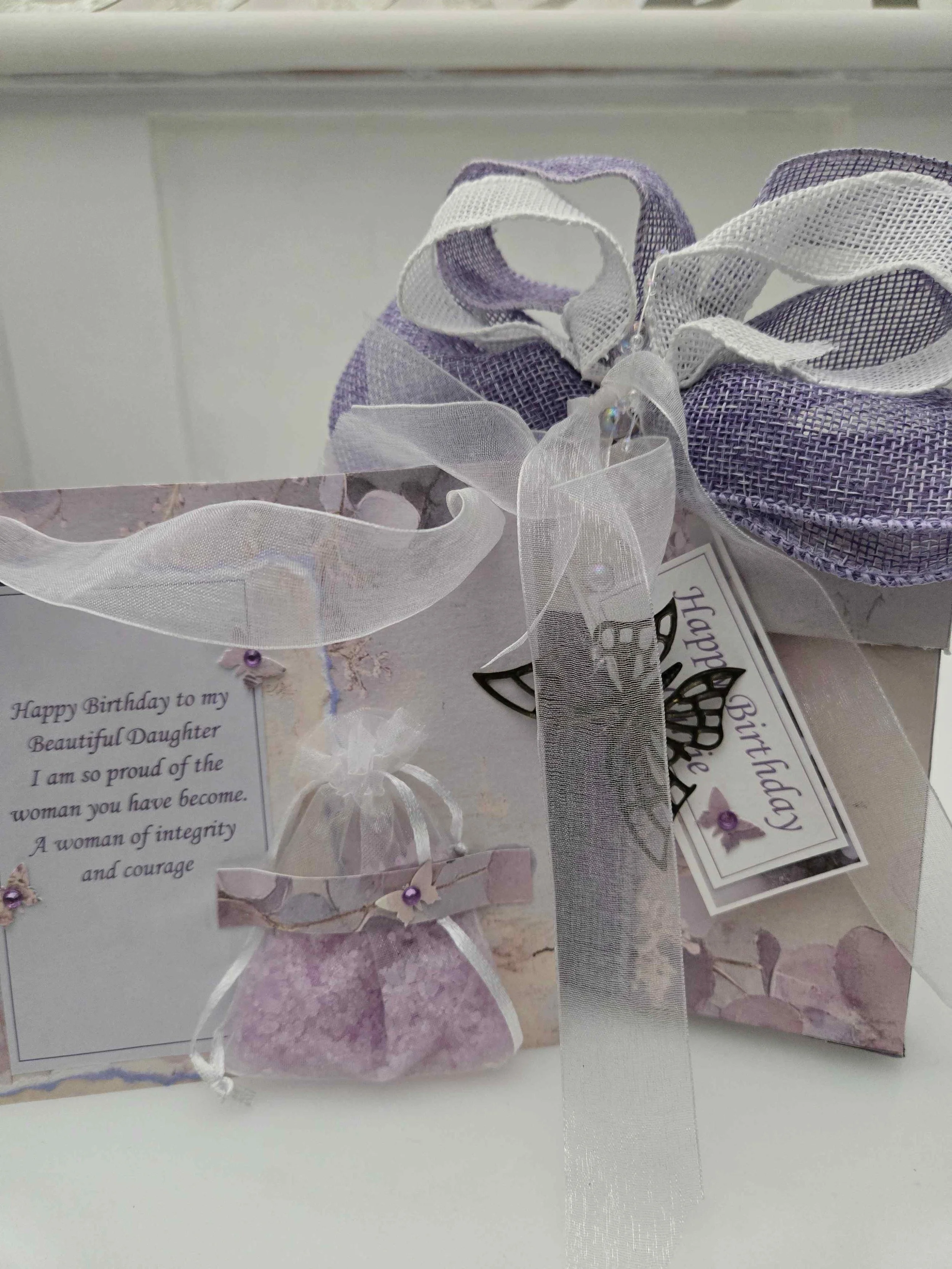 Handmade turquoise 3D butterfly present card with triple ribbon bow in a luxury box.