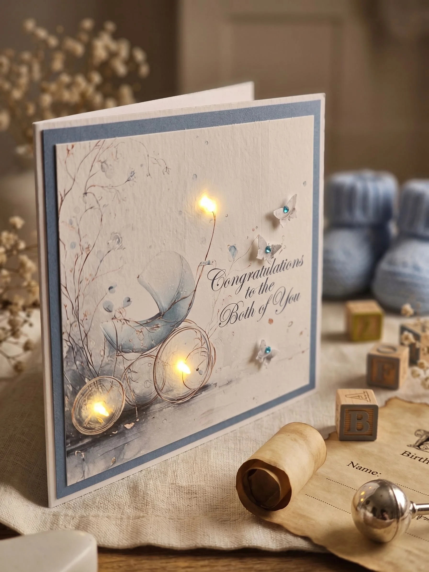 Handmade baby boy pram card with warm LED lights.jpg