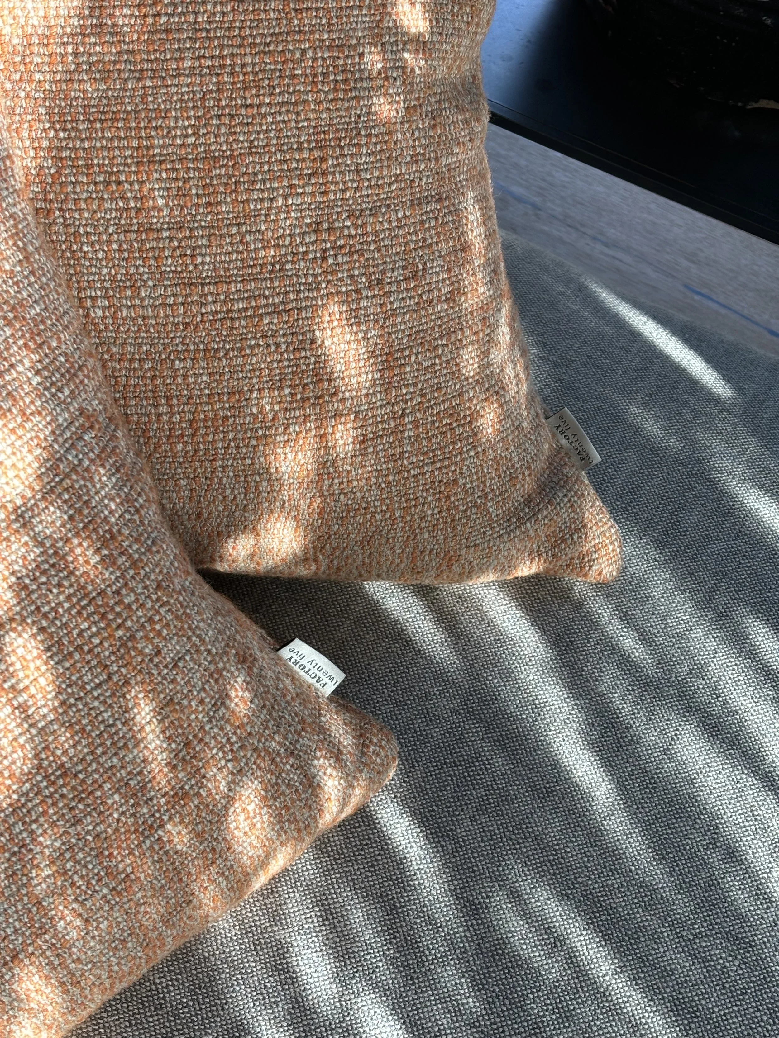 An image of a cushion cover in a rich linen fabric