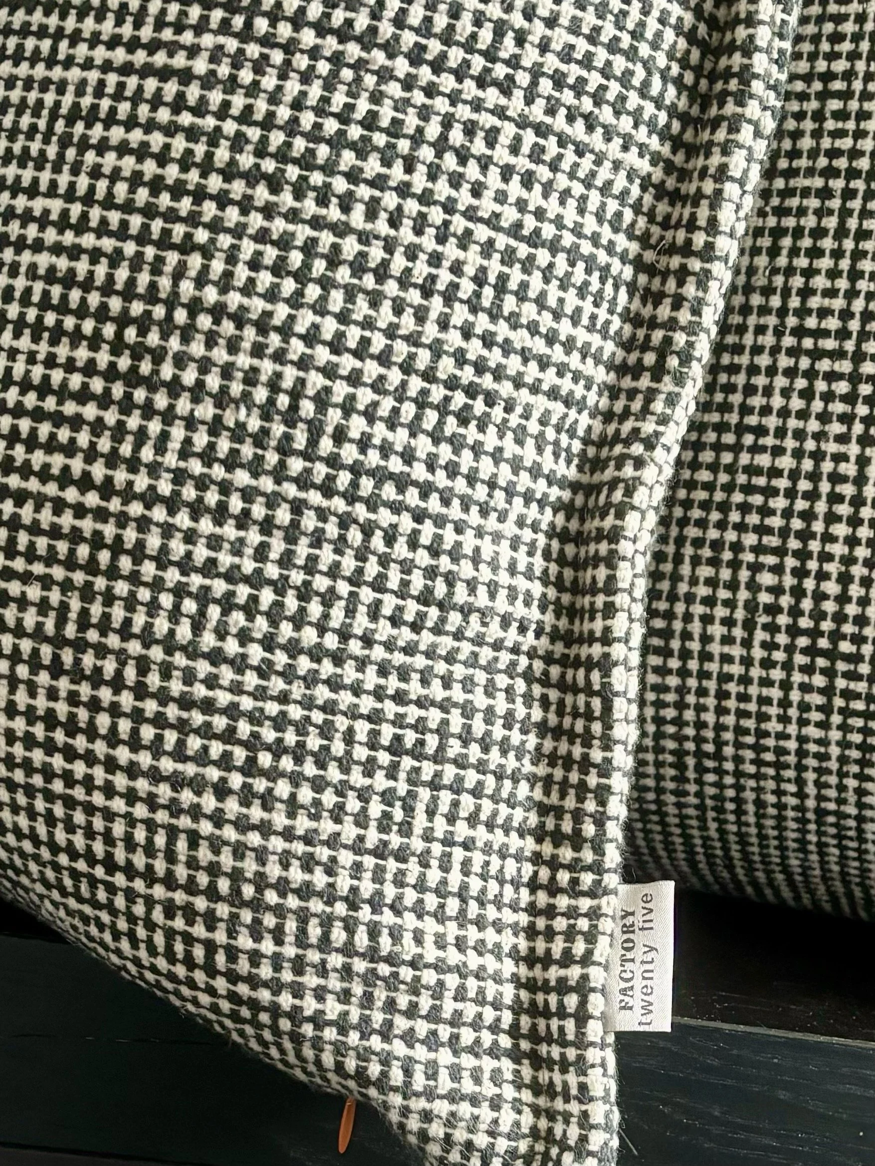 An image of a cushion cover in a sturdy cotton fabric.