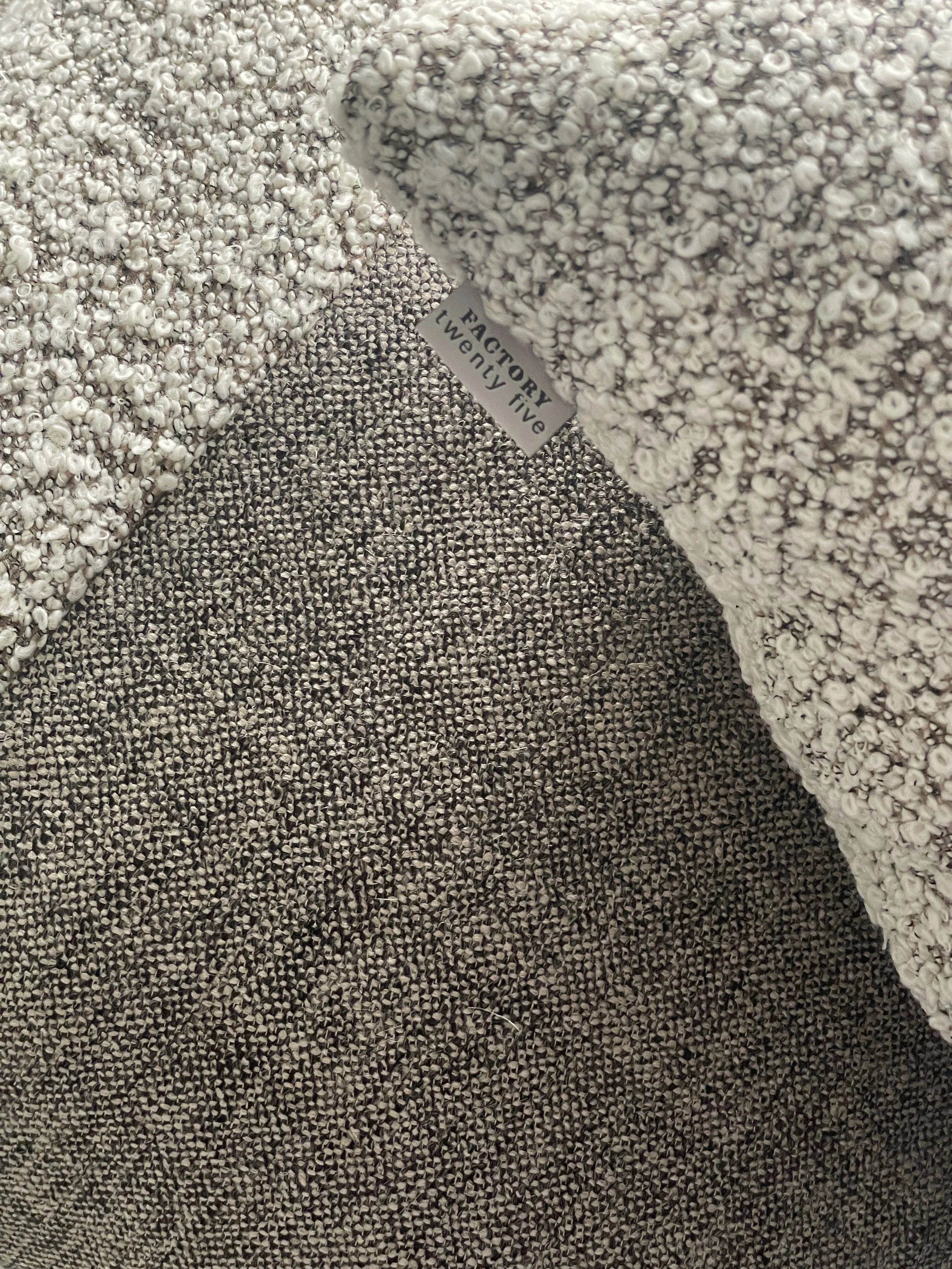 An image of a cushion cover in patchwork style.