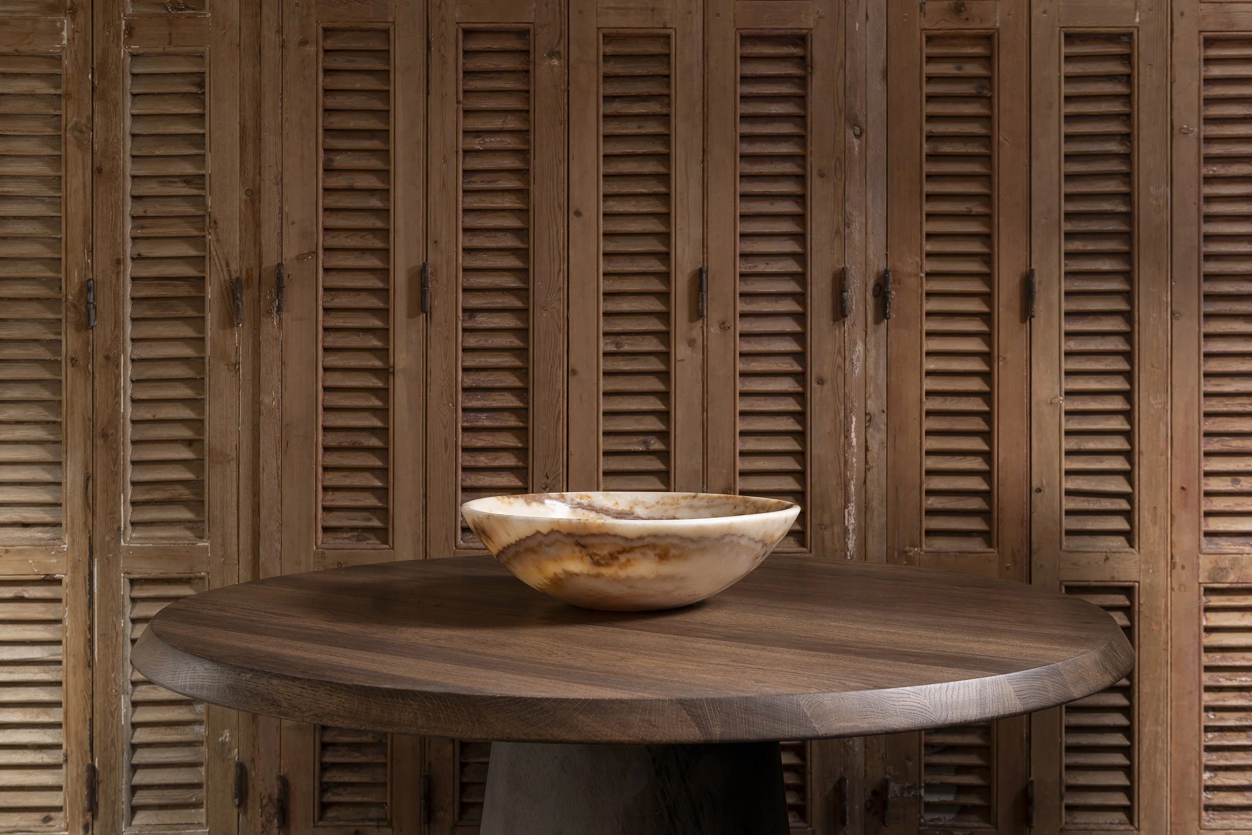 An image of a round low dining table.