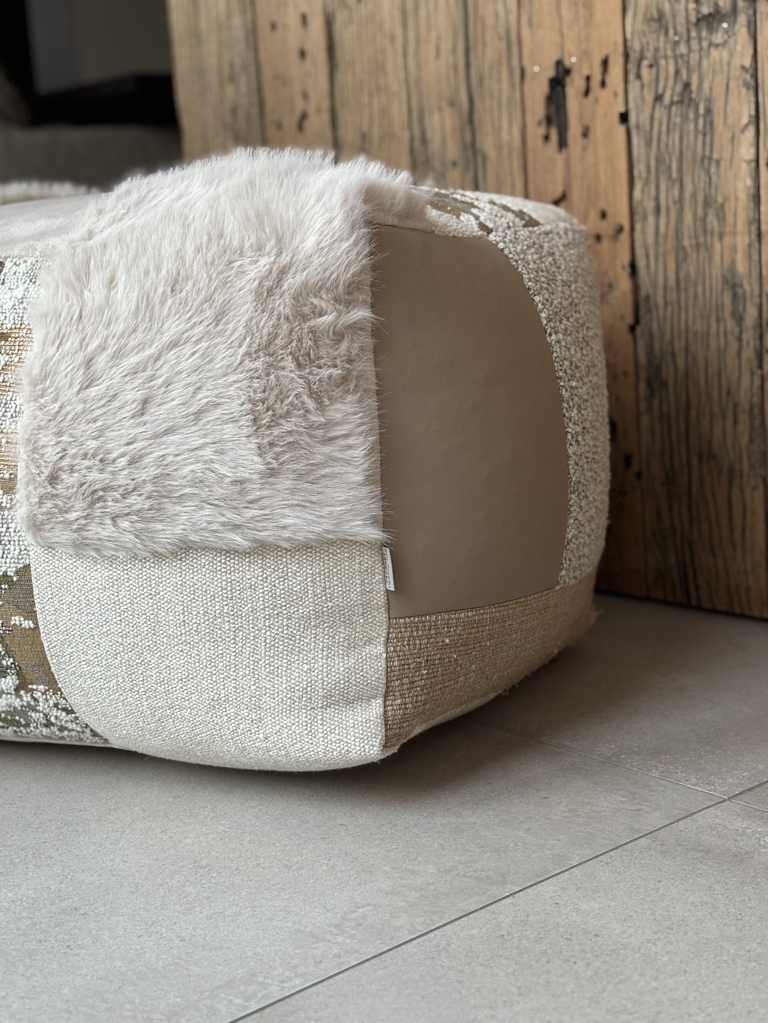 an image of an intricate patchwork pouf.
