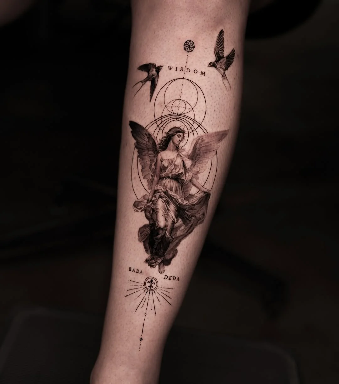 Geometric, angelic tattoo by Migo at Hanok Studio