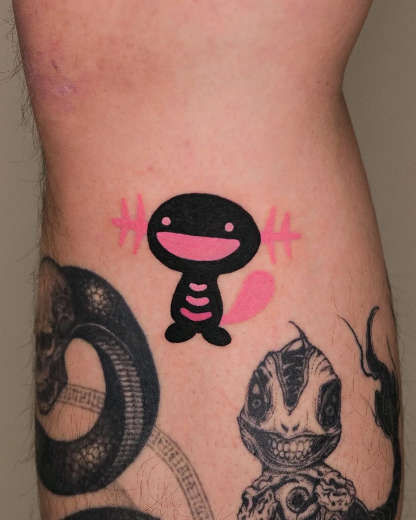 Pink Mayo Hanok Studio Artist Pink and Black tattoo