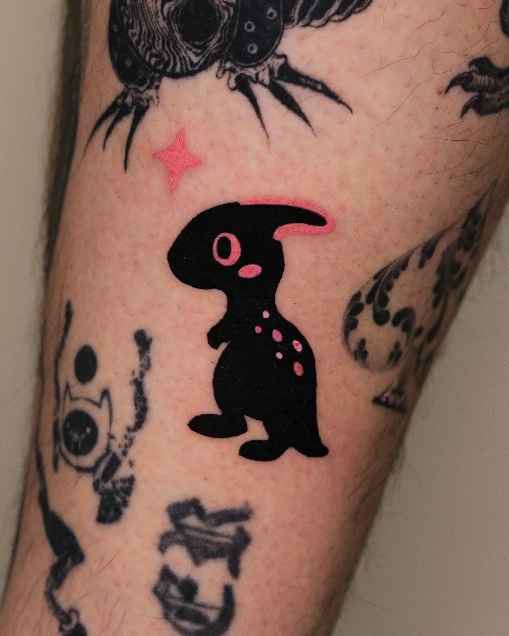 Pink Mayo Hanok Studio Artist Pink and Black Dinosaur tattoo