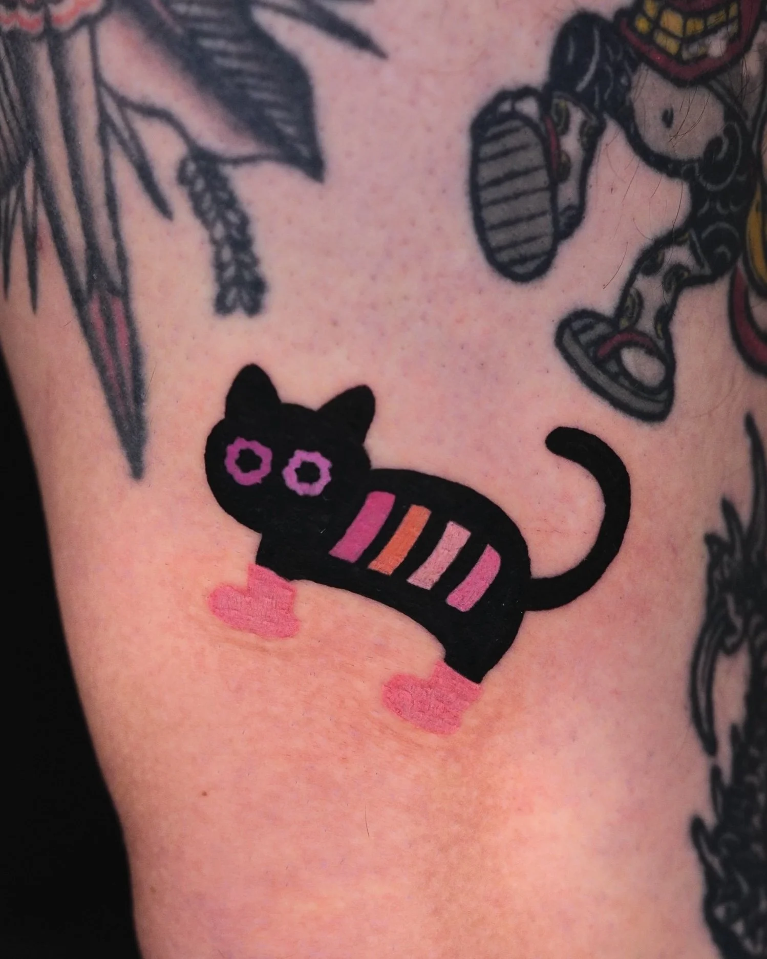 Pink Mayo Hanok Studio Artist Pink and Black cat tattoo