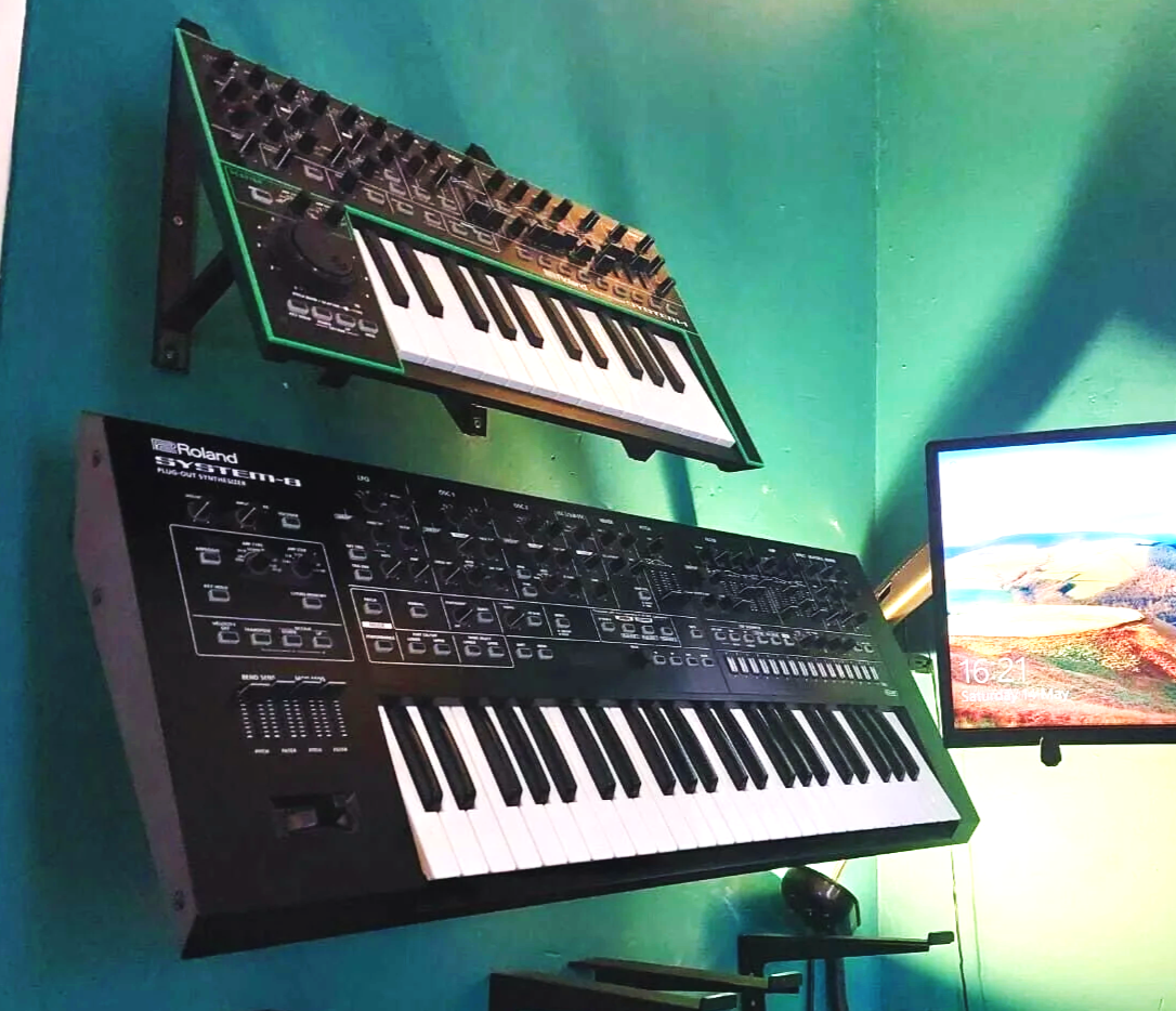 Wall mounted modular synth and drum machine support system for studio workflows