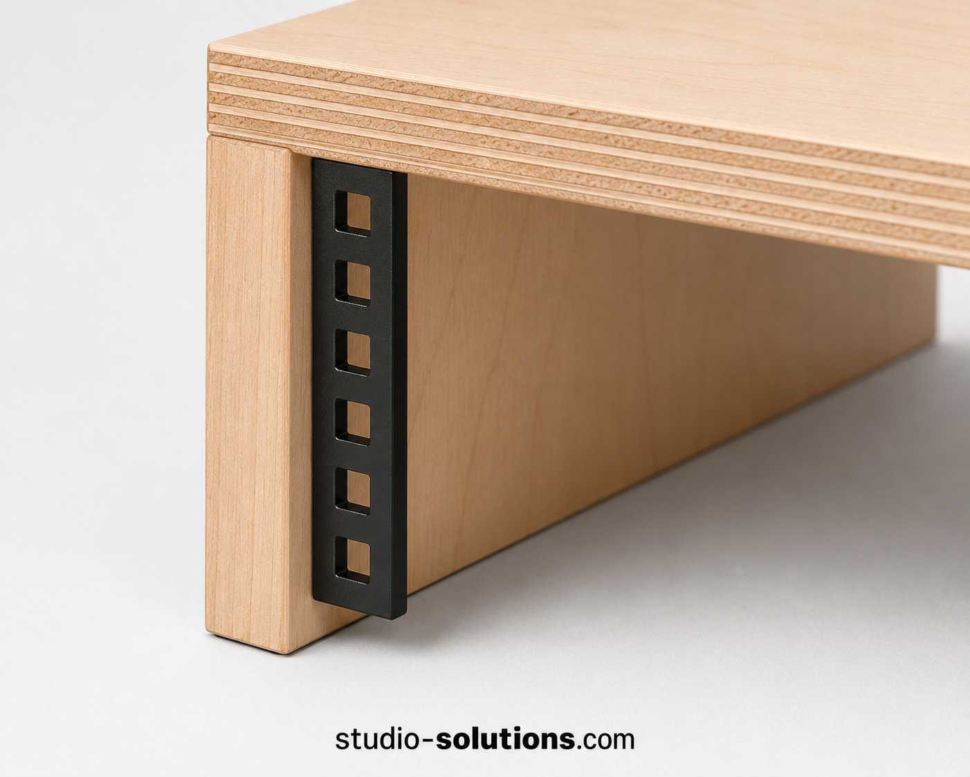 Flat-pack studio monitor stand with open 2U rack space