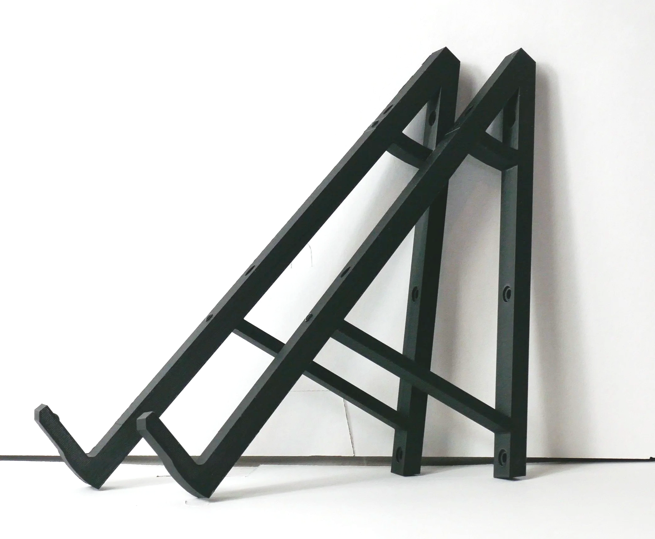 Large wall mounted synthesiser arms for modular and desktop music studio equipment
