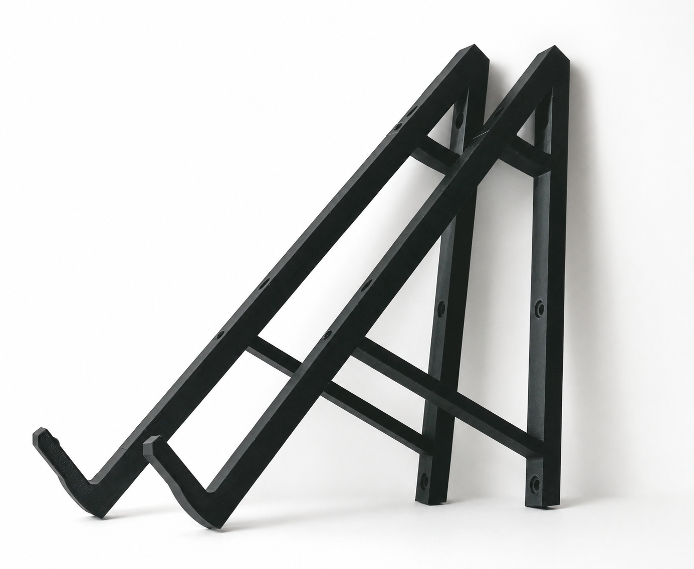 Wall-mounted brackets for supporting synthesizers and music studio equipment