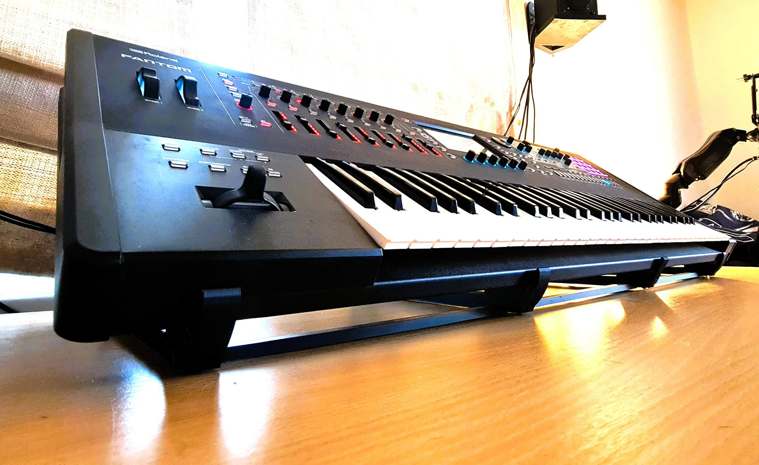 XL workstation synth riser supporting a Roland Fantom workstation keyboard in a professional music production studio (2).jpg