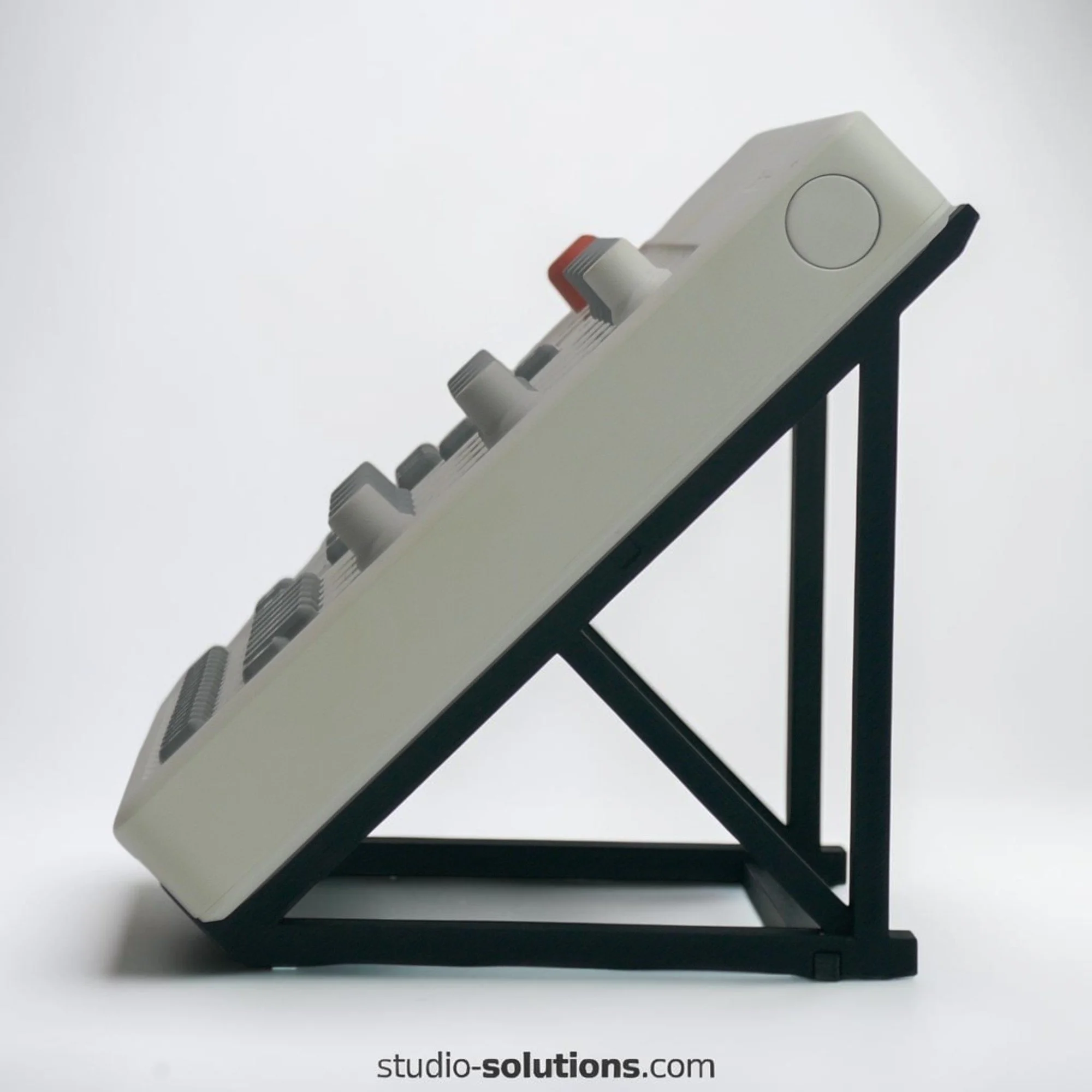 Elektron Model Samples and Model Cycles drum machine sampler mounted on 45 degree angled desktop stand for DAWless electronic music production