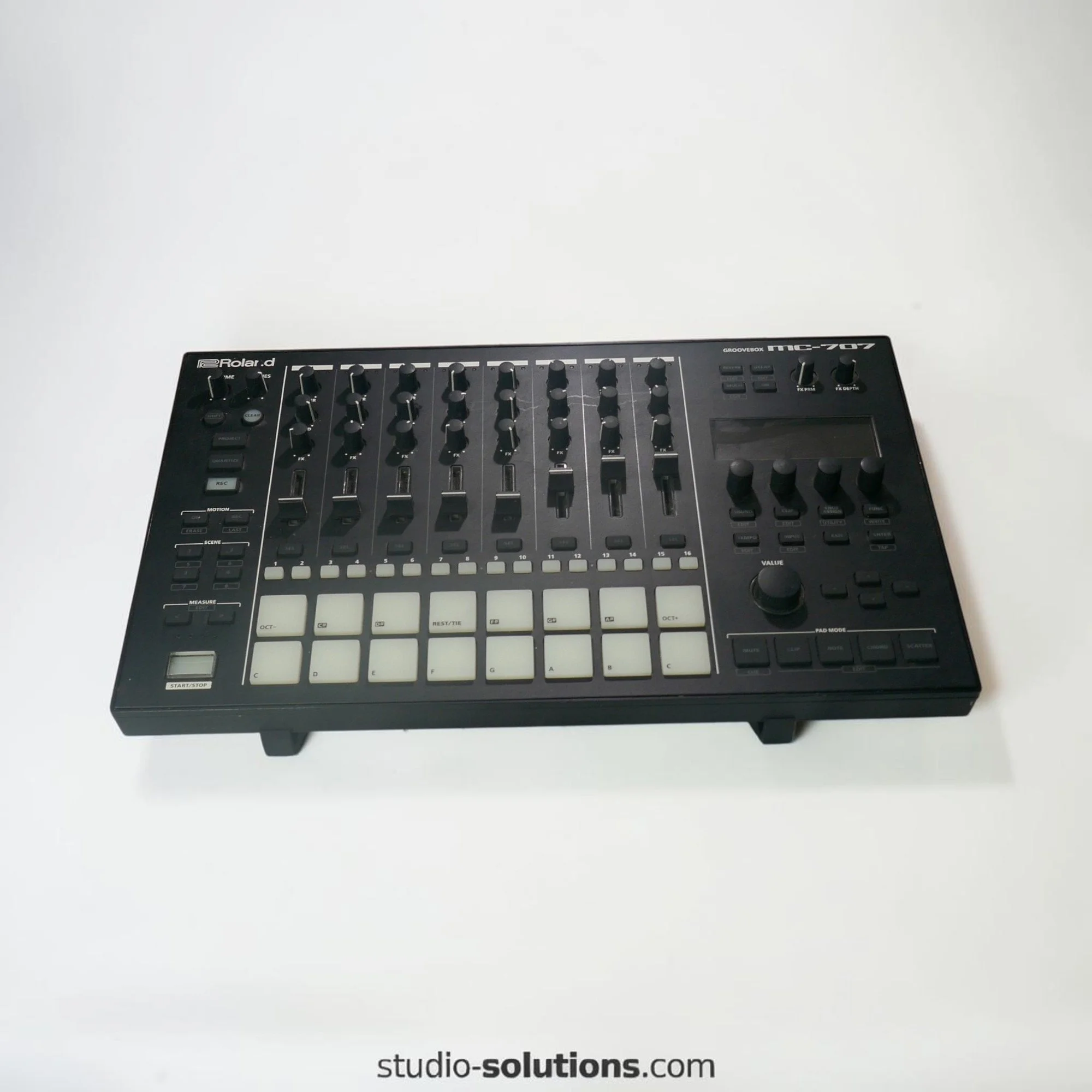 High angle Roland MC-707 stand for live performance workflow