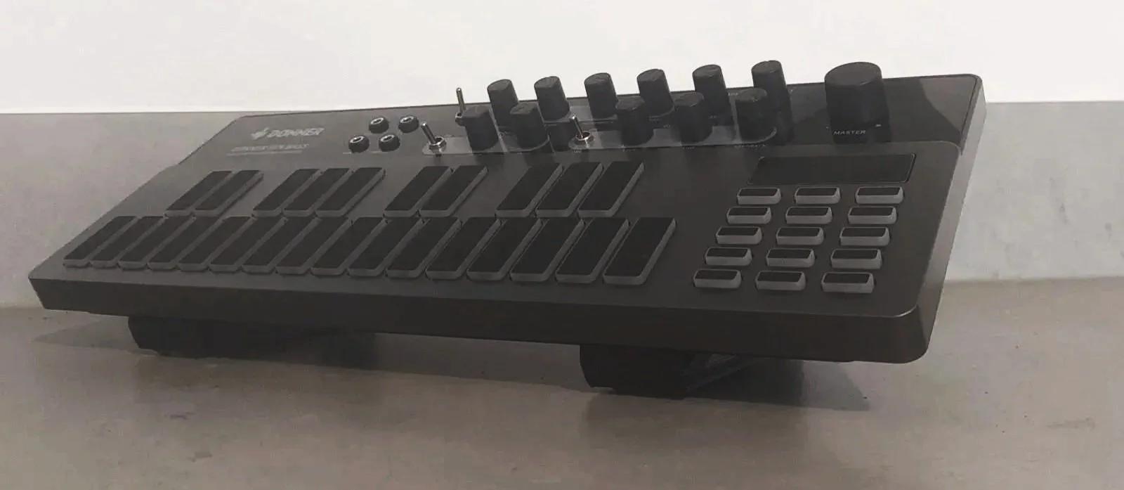 Image ALT Text Low profile wedge stand for portable grooveboxes sequencers and DAWless studios