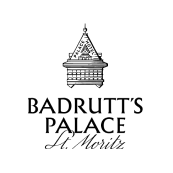 Logo of Badrutt's Palace in St. Moritz with an illustration of a building and the hotel name.