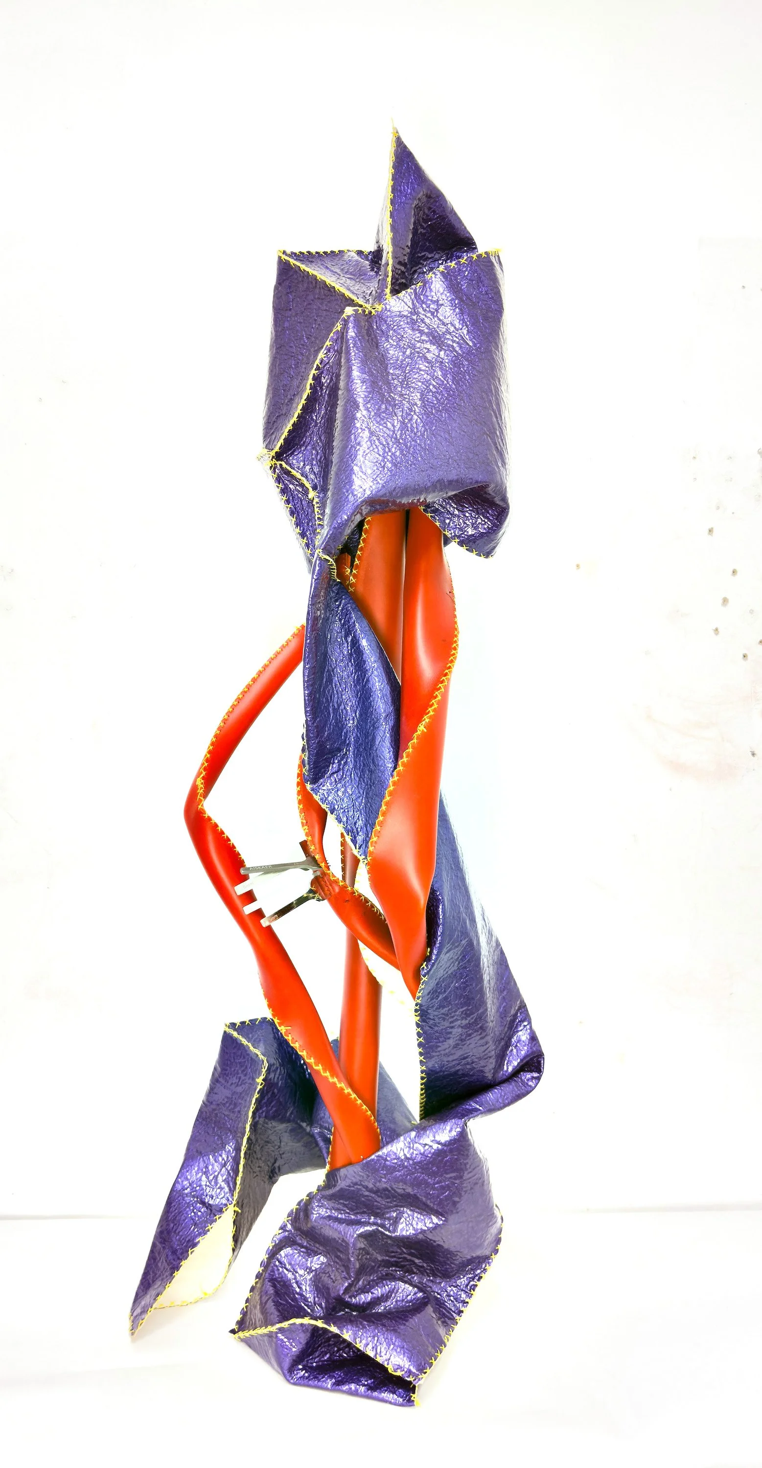 It's (almost) skin break, babe!,
2026,
Hemp-vegan leather, veg-tan leather, cross-stitch sutures, the chisels the leather broke, the needles that punctured my fingers.
38” x 23” 30” 