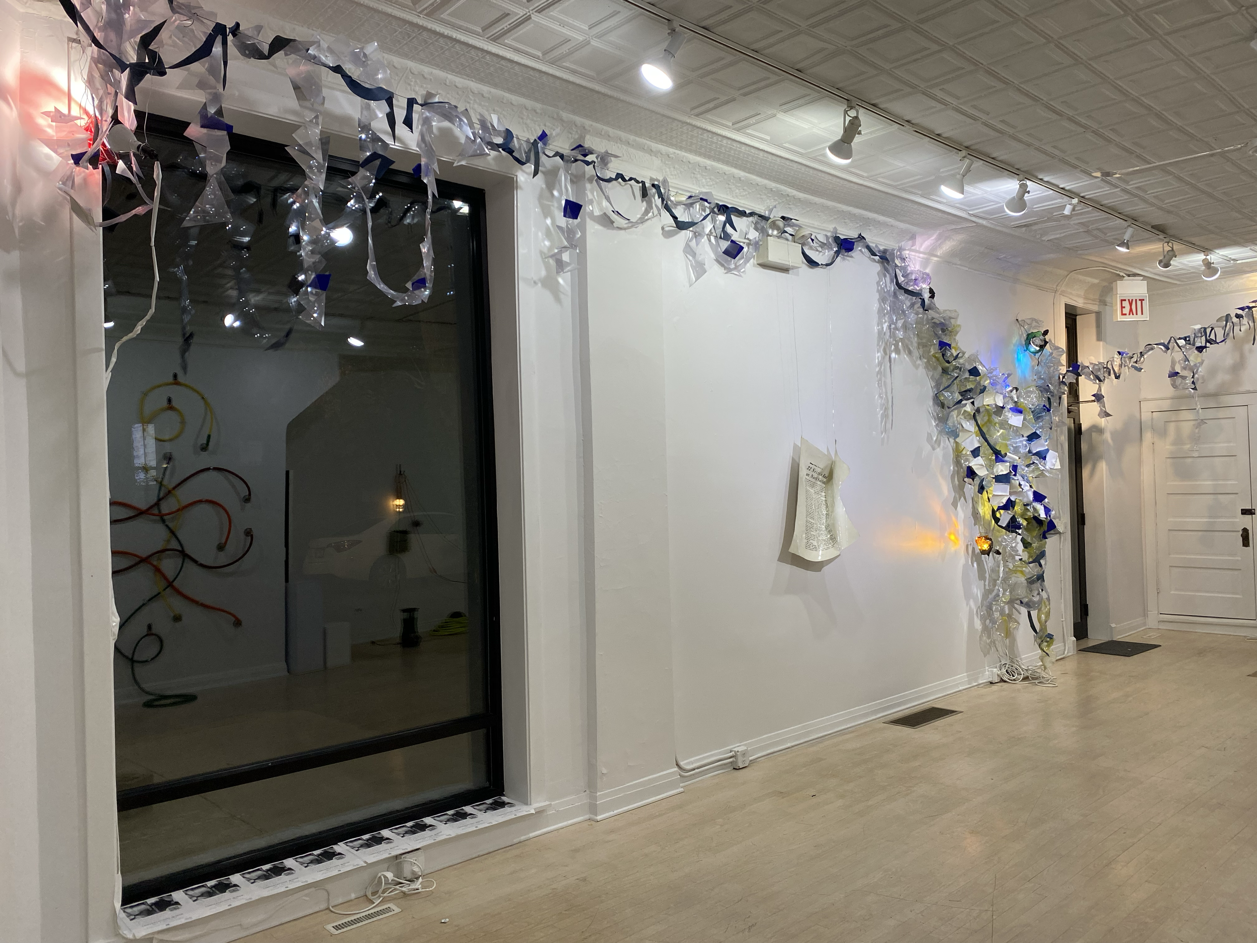 Keeping a House of Ill Fame, 2021
Fresnel lenses, leather, light, screen printed Chicago Tribune article onto pleather
Dimensions variable