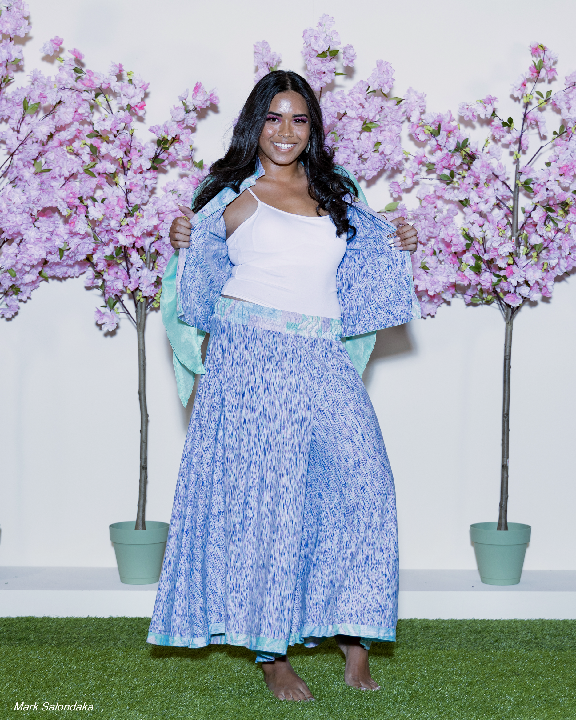 Model: Nevaeh. Wearing: Flare! Pants and Split-Sleeve Top