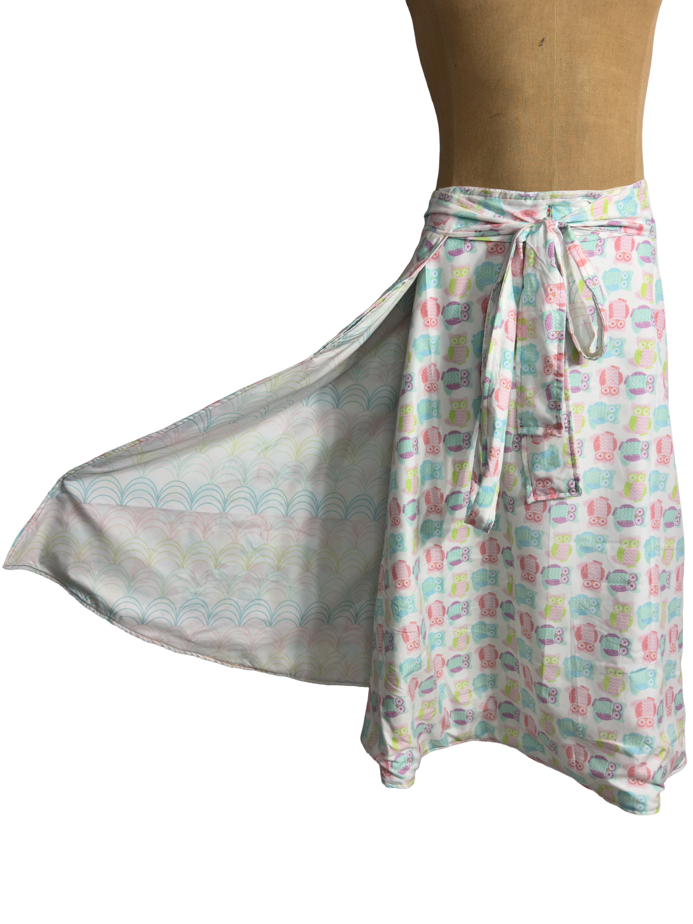 Long skirt with a colorful owl pattern on a dress form