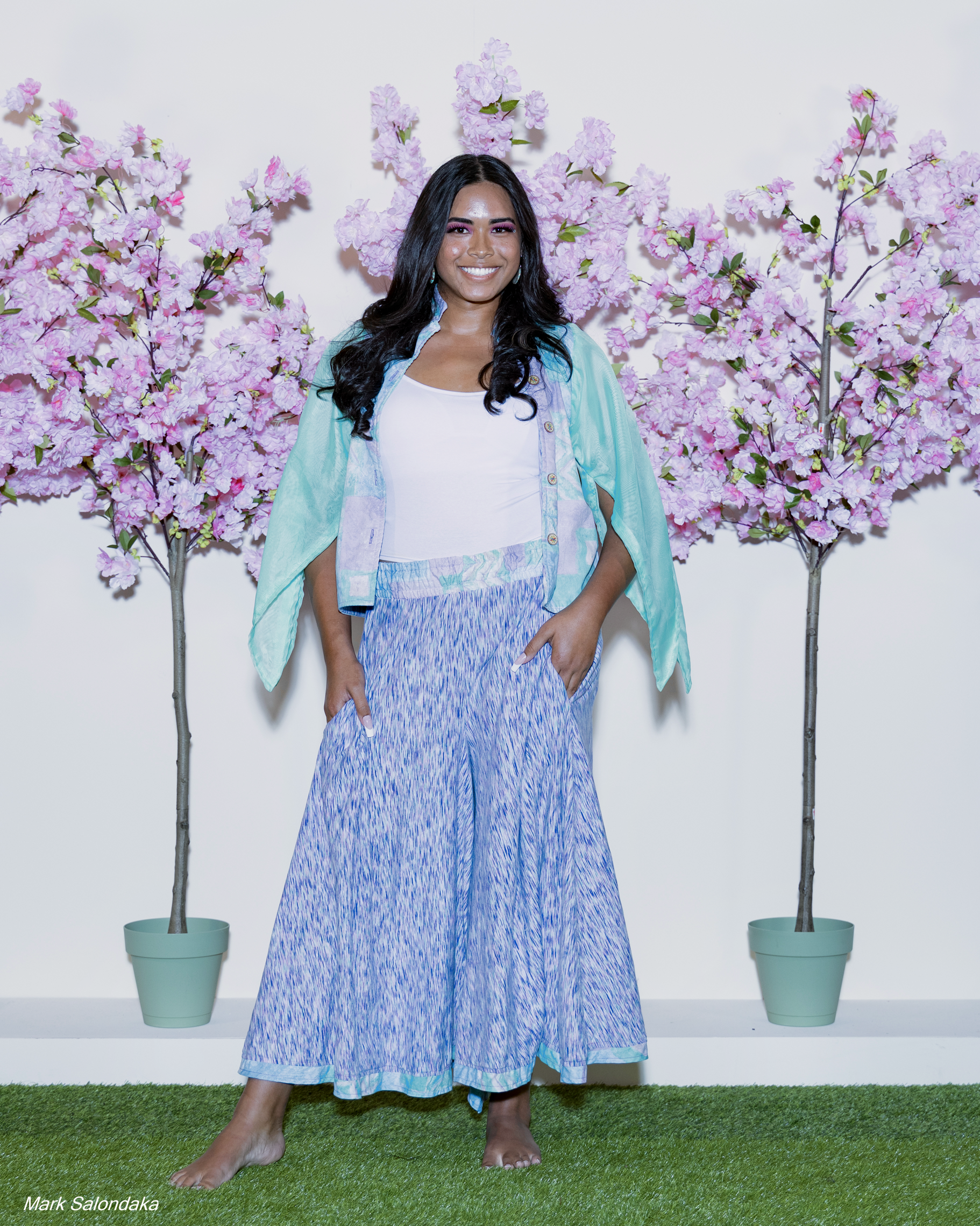 Model: Nevaeh. Wearing: Flare! Pants and Split-Sleeve Top