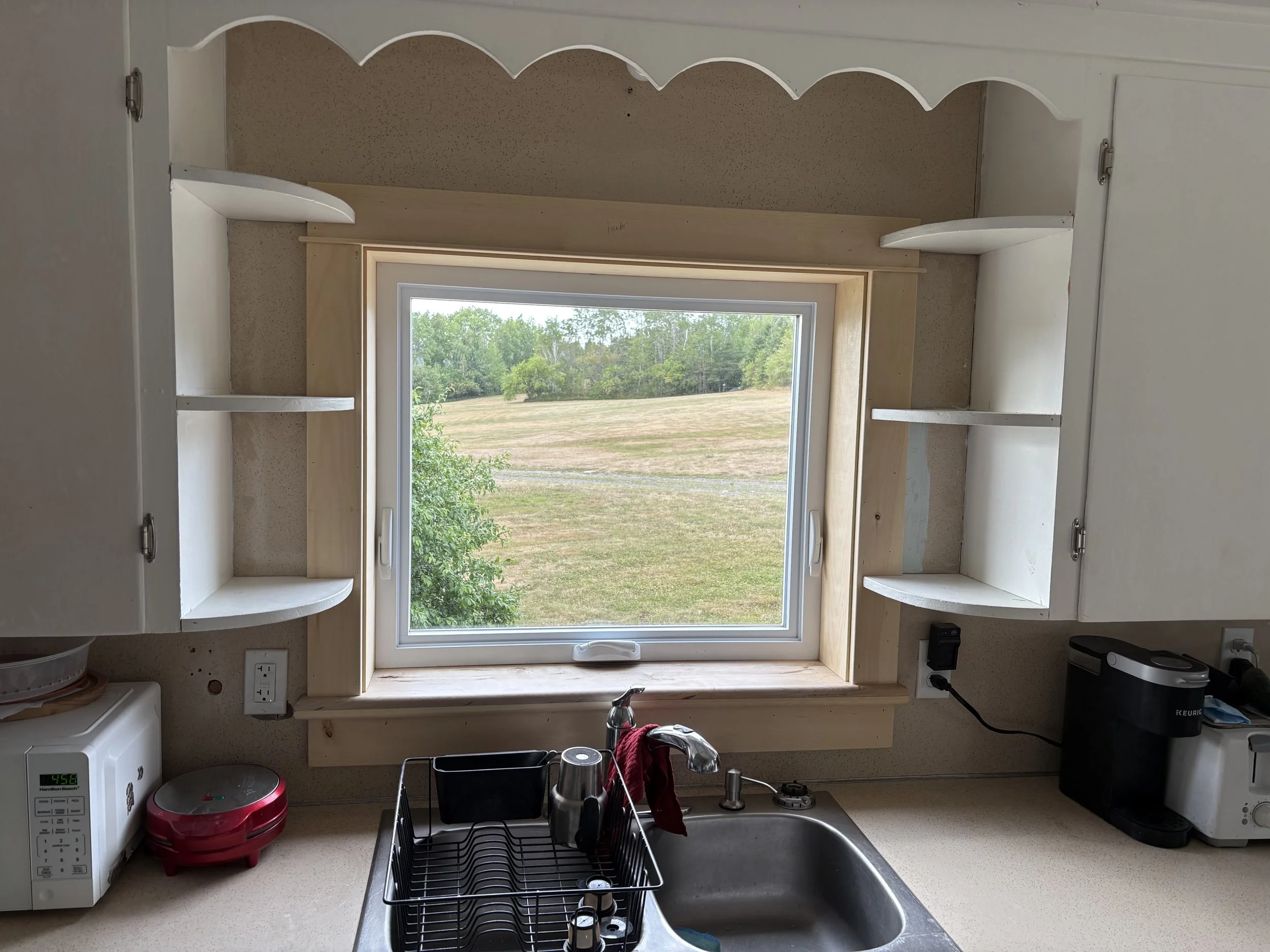 Oranssi technician working on a roof project